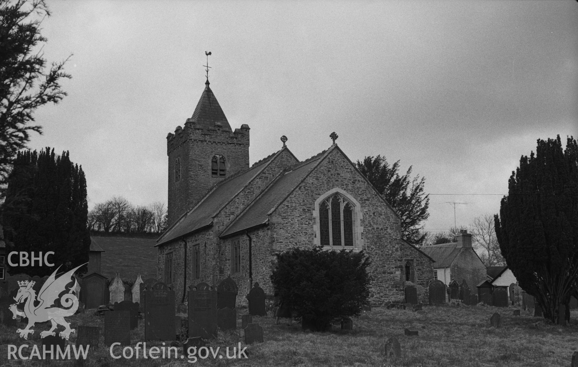 Digital copy of a black and white negative showing exterior view of St Gwynin's church, Llanwnnen. Photographed in April 1963 by Arthur O. Chater from Grid Reference SN 5336 4725, looking west north west.