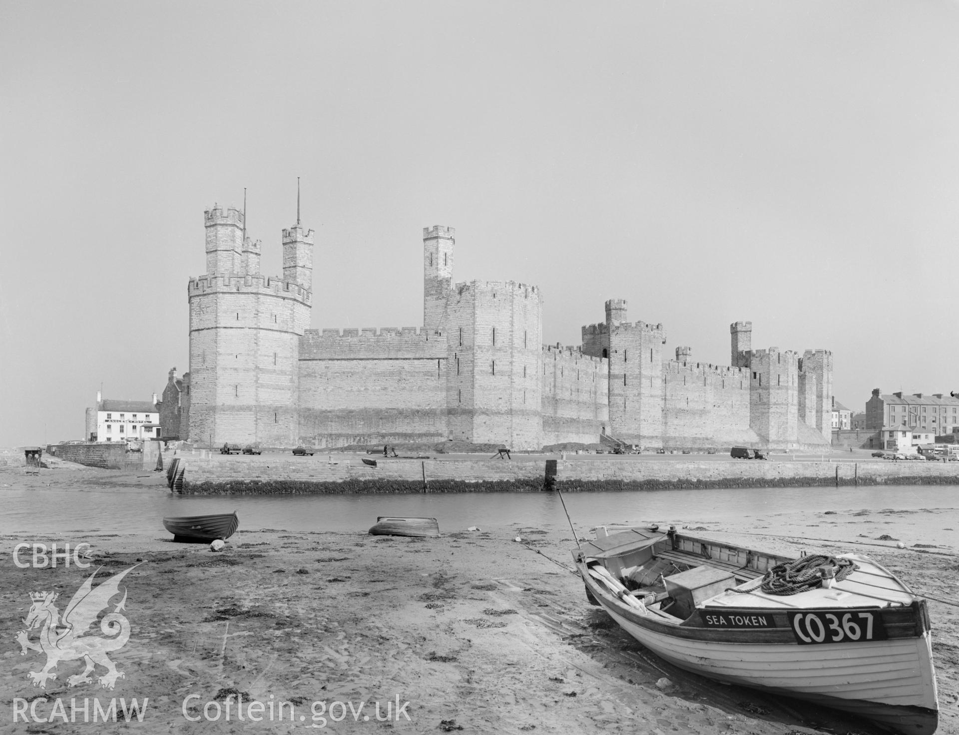 Digital copy of a black and white negative showing a view of Caernarfon Castle, from the Central Office of Information.