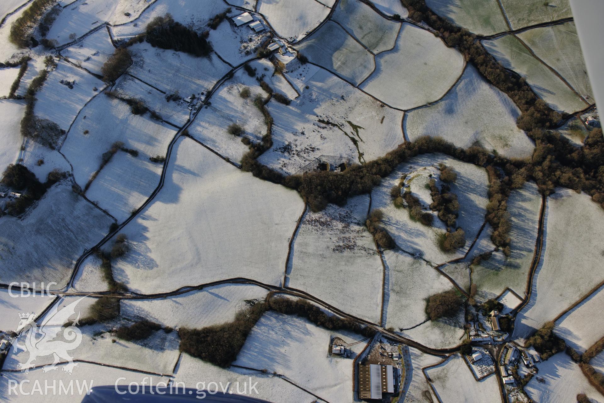 Crickadarn Castle earthworks, south east of Builth Wells. Oblique aerial photograph taken during the Royal Commission?s programme of archaeological aerial reconnaissance by Toby Driver on 15th January 2013.