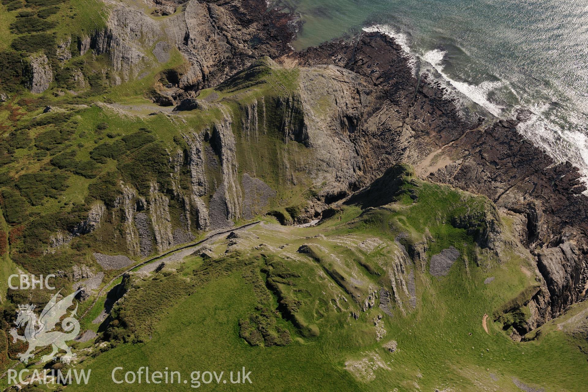 Yellow Top fort, on the south western shores of the Gower Peninsula. Oblique aerial photograph taken during the Royal Commission's programme of archaeological aerial reconnaissance by Toby Driver on 30th September 2015.