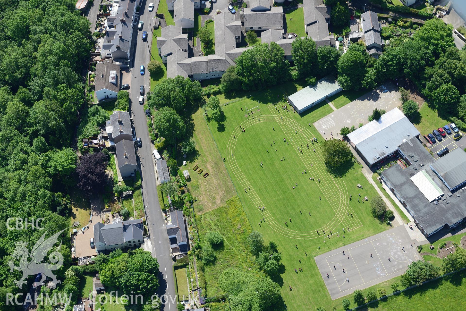 St. Mary's Catholic Primary School and playing fields, Bridgend. Oblique aerial photograph taken during the Royal Commission's programme of archaeological aerial reconnaissance by Toby Driver on 19th June 2015.