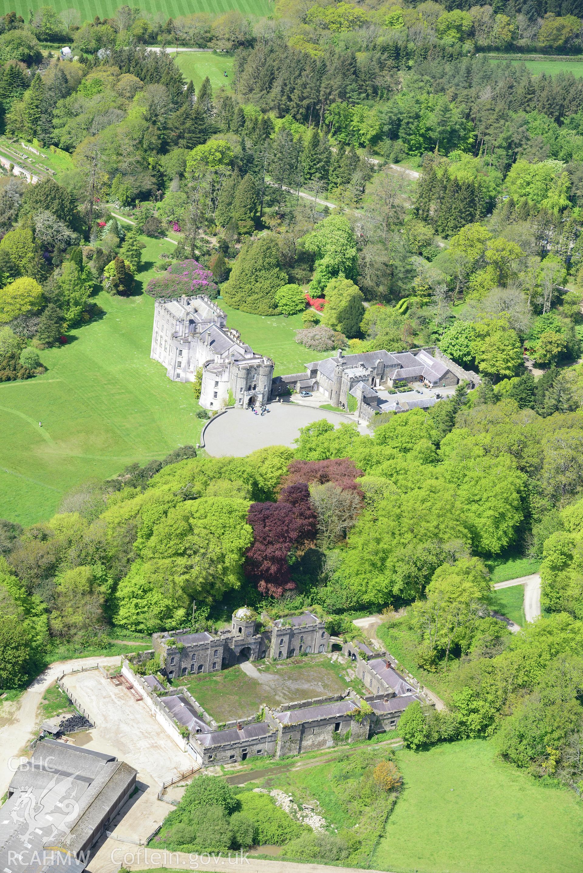 Picton Castle, its gardens and its stables, Slebech. Oblique aerial photograph taken during the Royal Commission's programme of archaeological aerial reconnaissance by Toby Driver on 13th May 2015.