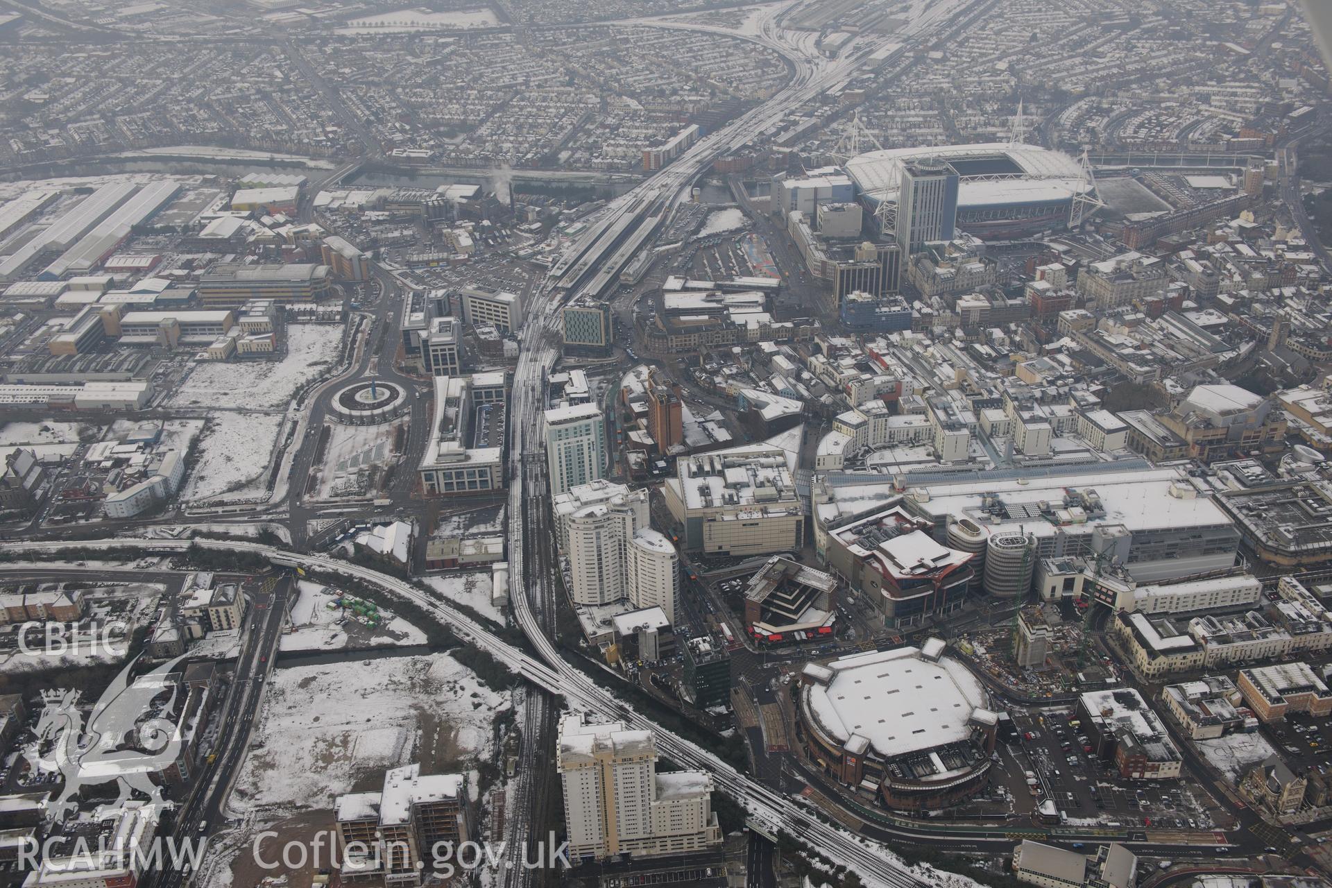 Cardiff Central railway station; Cardiff Millennium Stadium and Cardiff International Arena, Cardiff. Oblique aerial photograph taken during the Royal Commission?s programme of archaeological aerial reconnaissance by Toby Driver on 24th January 2013.