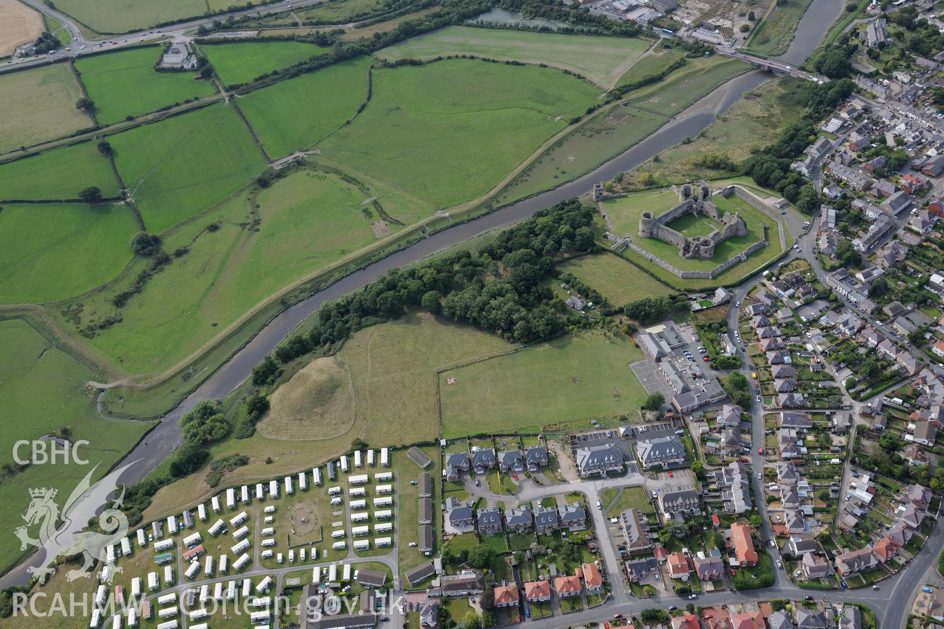 Twt Hill motte and bailey, Rhuddlan Castle and the town of Rhuddlan. Oblique aerial photograph taken during the Royal Commission's programme of archaeological aerial reconnaissance by Toby Driver on 11th September 2015.