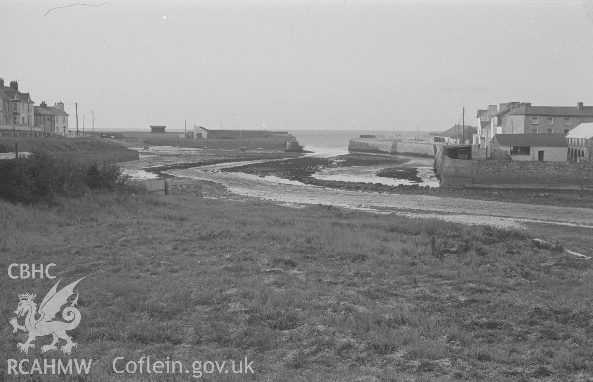 Black and White photograph showing view down the harbour at Aberaeron, from just west of the bridge. Photographed by Arthur Chater in December 1962 from Grid Reference SN 4574 6282, looking north west.