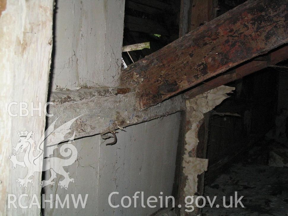 Dwelling end of Allt Ddu farmhouse, kitchen/living room, hooks on ceiling joists.
