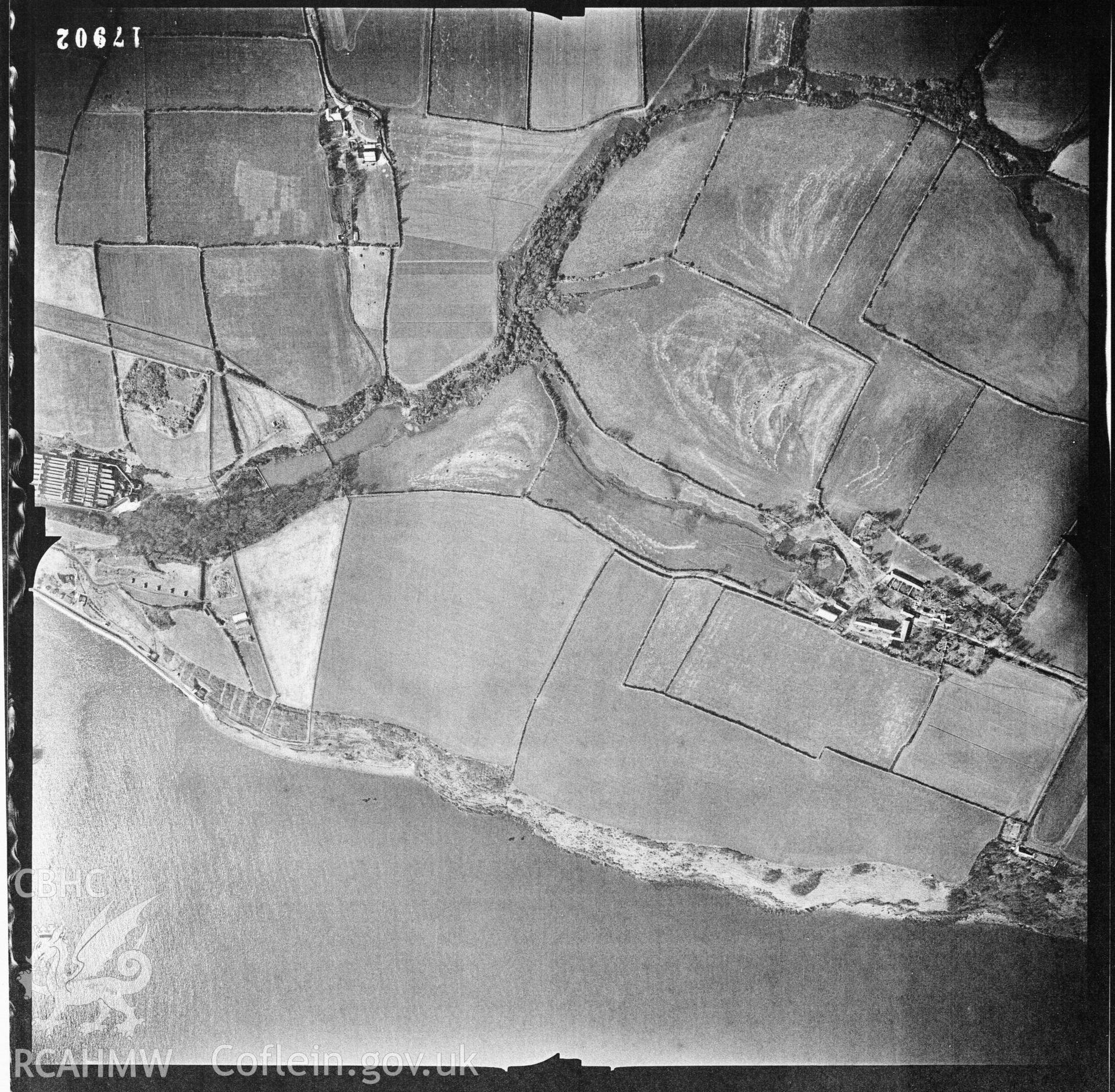 Digital copy of an aerial photograph taken in 1955 , showing the assessment area.