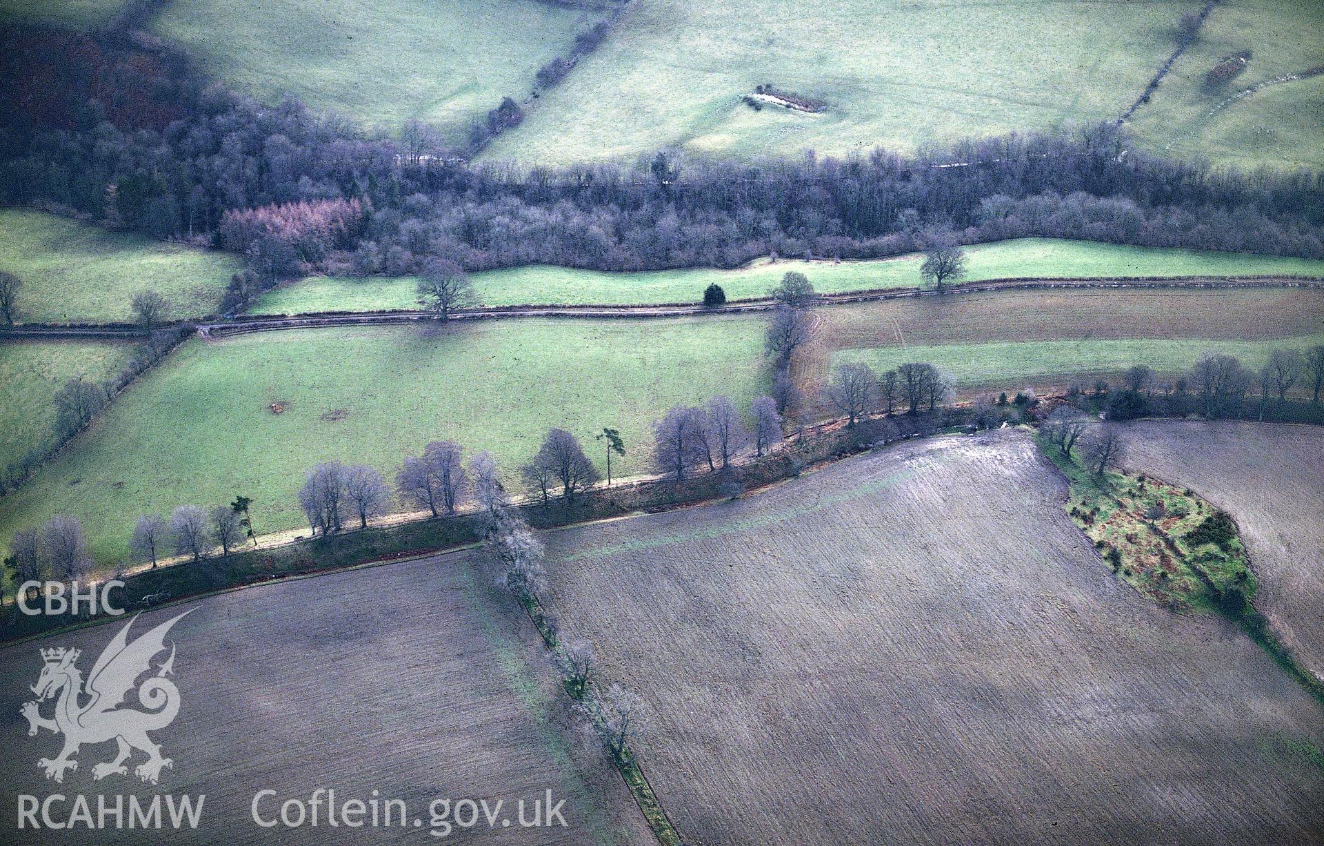 RCAHMW colour slide oblique aerial photograph of Offa's Dyke, Section From Footpath S Of Pen-y-bryn To Orseddwen, Glyntraian, taken by C.R. Musson, 23/01/94