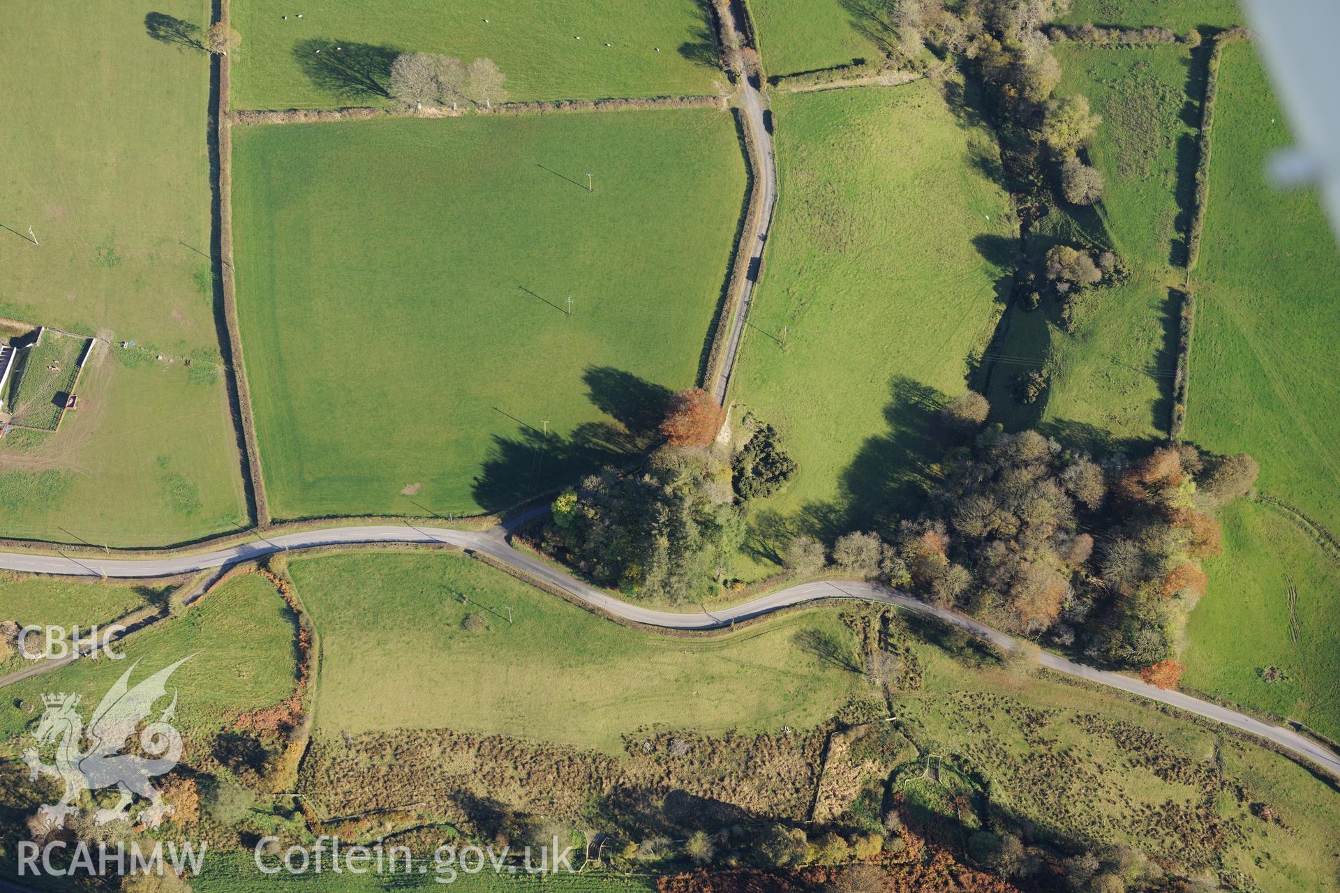 Farmland and buildings associated with Castell Howell farm, near Lampeter. Oblique aerial photograph taken during the Royal Commission's programme of archaeological aerial reconnaissance by Toby Driver on 2nd November 2015.