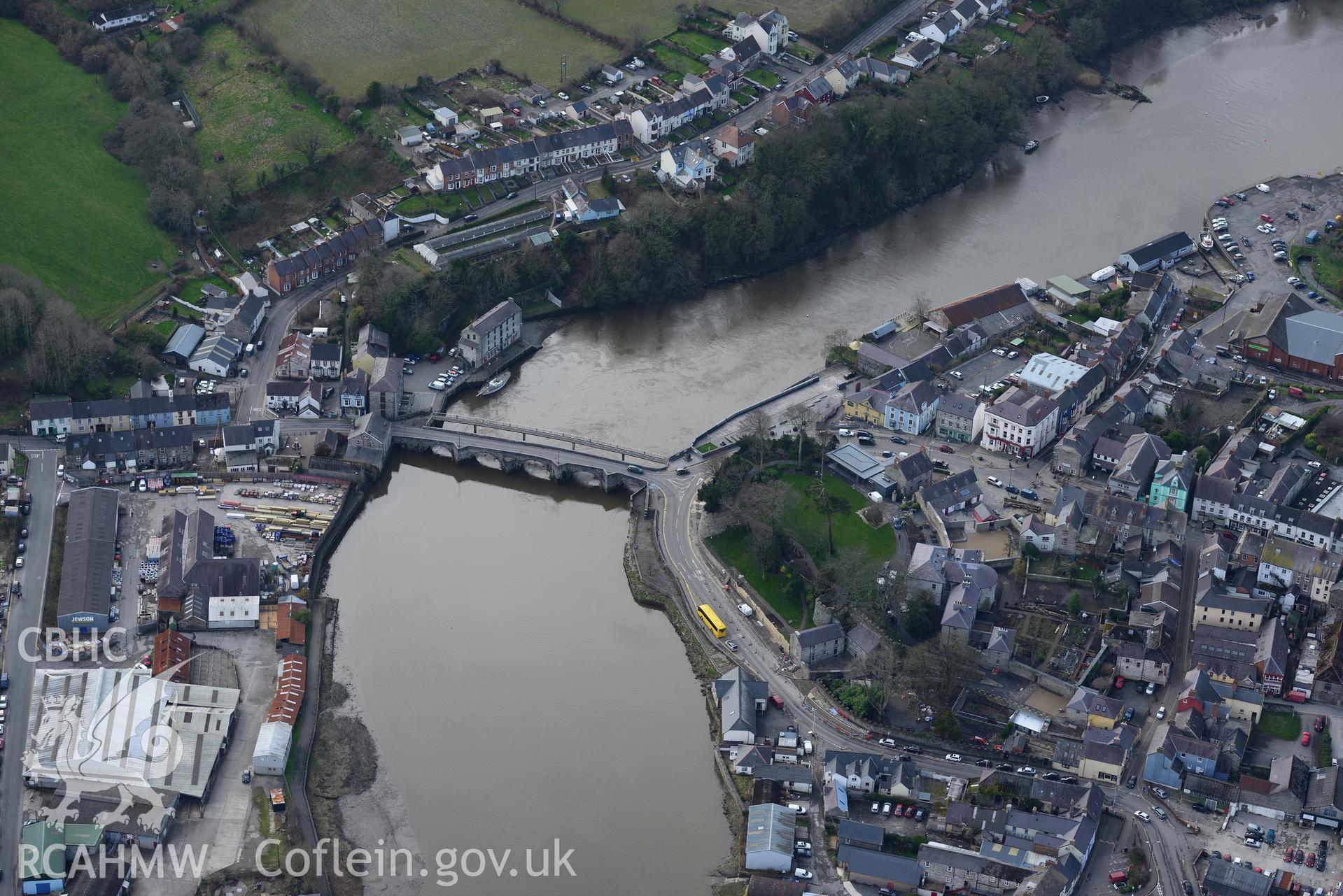 Cardigan Castle, the associated house and garden, and Cardigan bridge, Cardigan. Oblique aerial photograph taken during the Royal Commission's programme of archaeological aerial reconnaissance by Toby Driver on 13th March 2015.