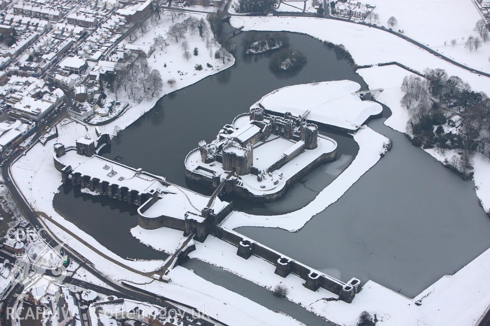 Caerphilly Castle. Oblique aerial photograph taken during the Royal Commission?s programme of archaeological aerial reconnaissance by Toby Driver on 24th January 2013.
