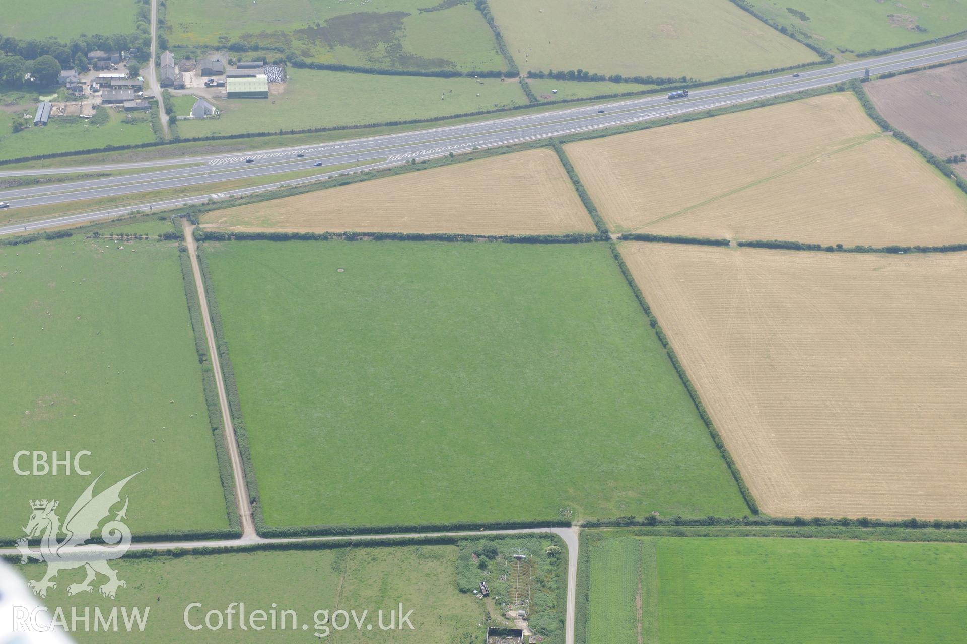 Site of Capel Eithin, Gaerwen, west of Llanfair PG, Anglesey. Oblique aerial photograph taken during the Royal Commission?s programme of archaeological aerial reconnaissance by Toby Driver on 12th July 2013.