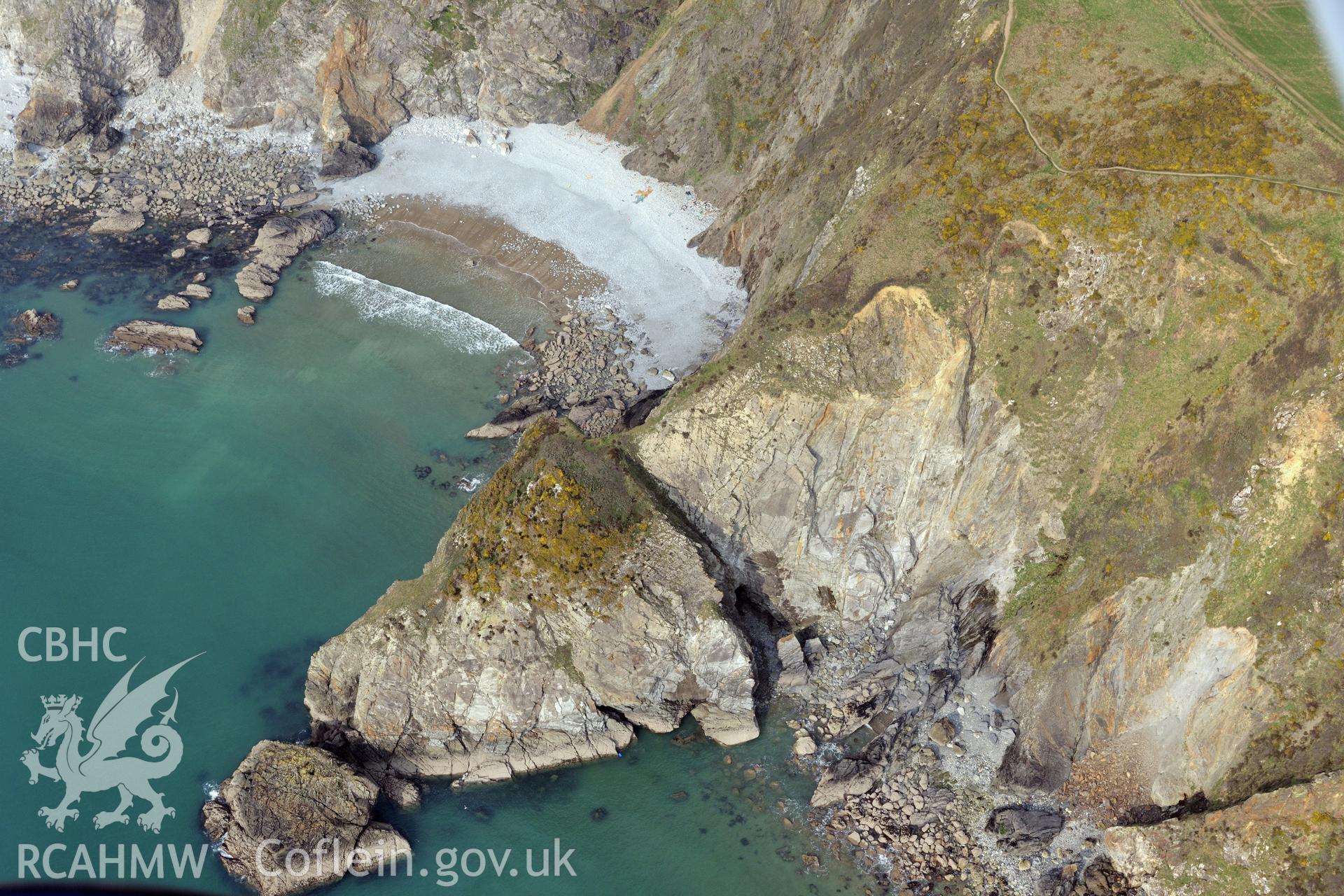 Royal Commission aerial photograph of Porth y Bwch promontory fort taken on 27th March 2017. Baseline aerial reconnaissance survey for the CHERISH Project. ? Crown: CHERISH PROJECT 2019. Produced with EU funds through the Ireland Wales Co-operation Programme 2014-2020. All material made freely available through the Open Government Licence.