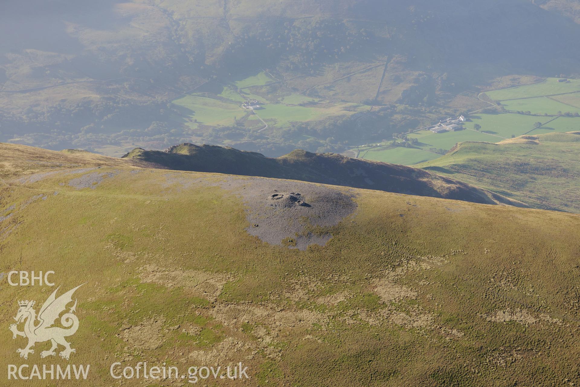 Mynydd Mawr cairn near Nantlle. Oblique aerial photograph taken during the Royal Commission's programme of archaeological aerial reconnaissance by Toby Driver on 2nd October 2015.