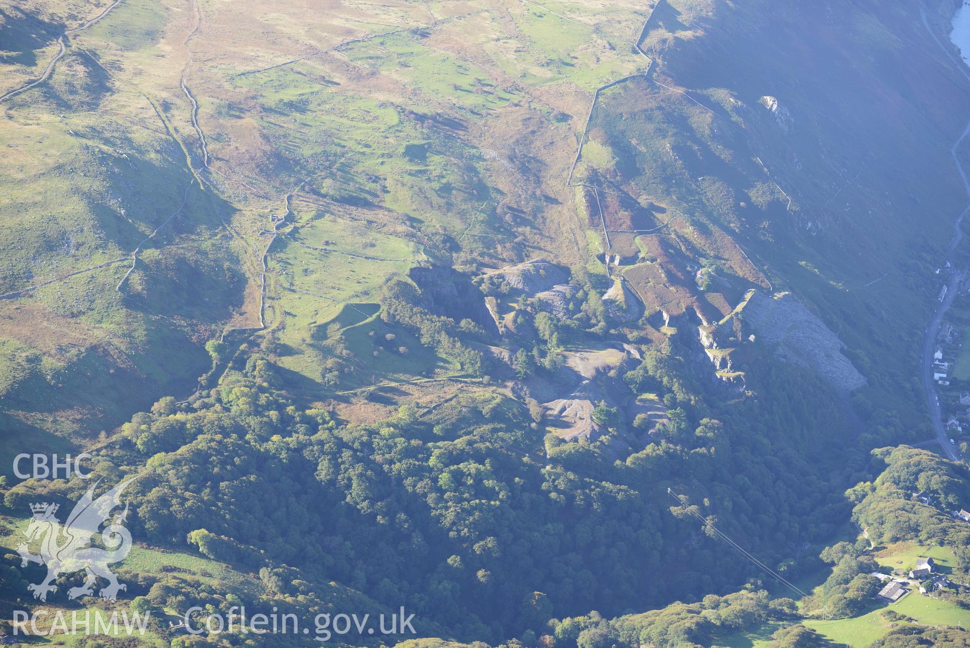 Hen-Ddol slate quarry, south east of Fairbourne. Oblique aerial photograph taken during the Royal Commission's programme of archaeological aerial reconnaissance by Toby Driver on 2nd October 2015.