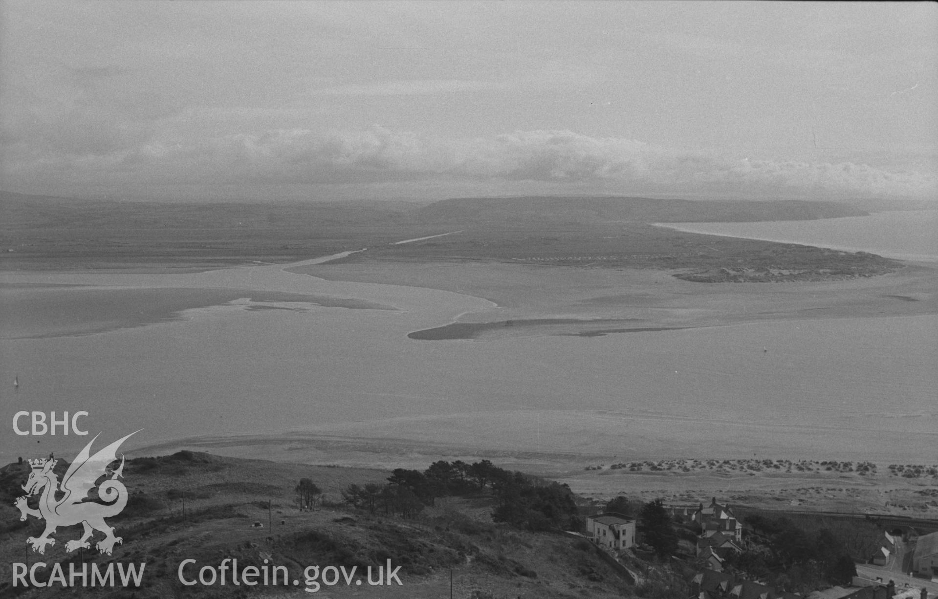 Digital copy of a black and white negative showing view across the Dyfi estuary from above Aberdovey. Photographed in April 1964 by Arthur O. Chater from Grid Reference SN 611 964, looking east - south south west.