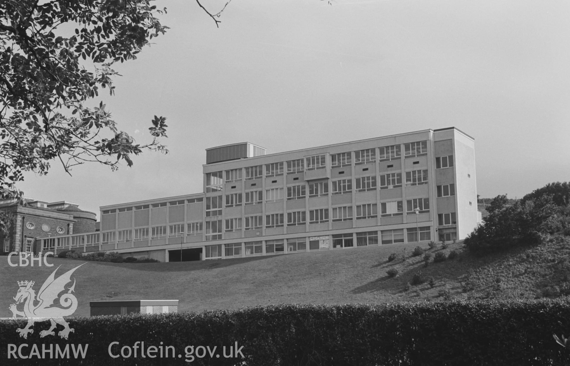 Digital copy of a black and white negative showing new chemistry department buildings, Plascrug, University College Wales Aberystwyth. Photographed by Arthur O. Chater in August 1967.
[Looking north from Plas Crug, SN 558 815]