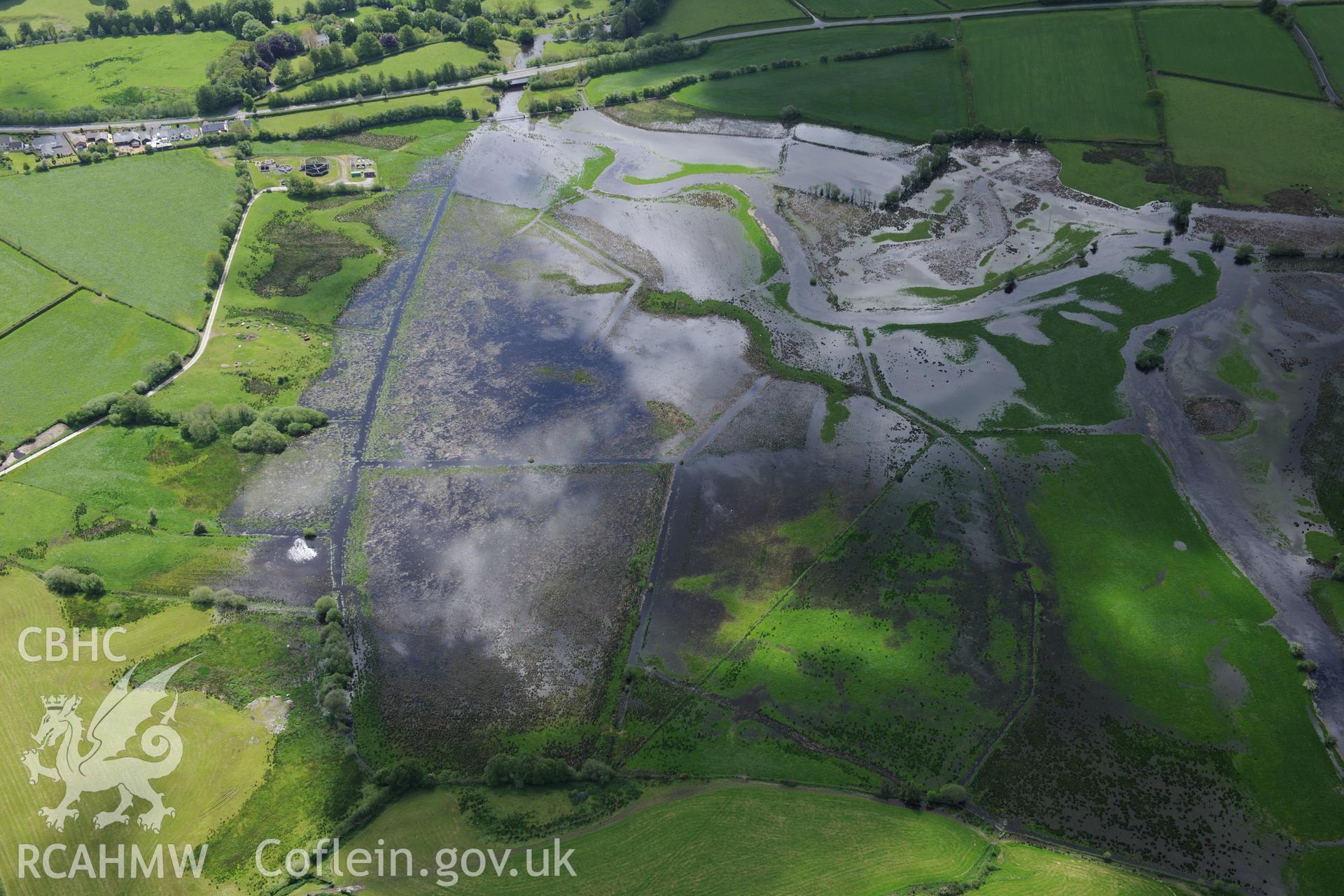 Flooding near pont Trecefel, half a mile south west of Tregaron. Oblique aerial photograph taken during the Royal Commission's programme of archaeological aerial reconnaissance by Toby Driver on 3rd June 2015.