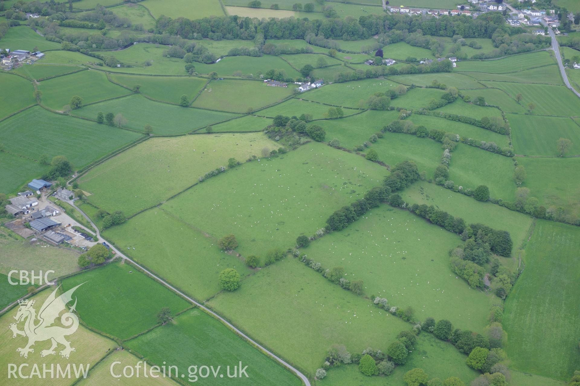 Possible hill fort site at Ty Newydd. Oblique aerial photograph taken during the Royal Commission's programme of archaeological aerial reconnaissance by Toby Driver on 3rd June 2015.