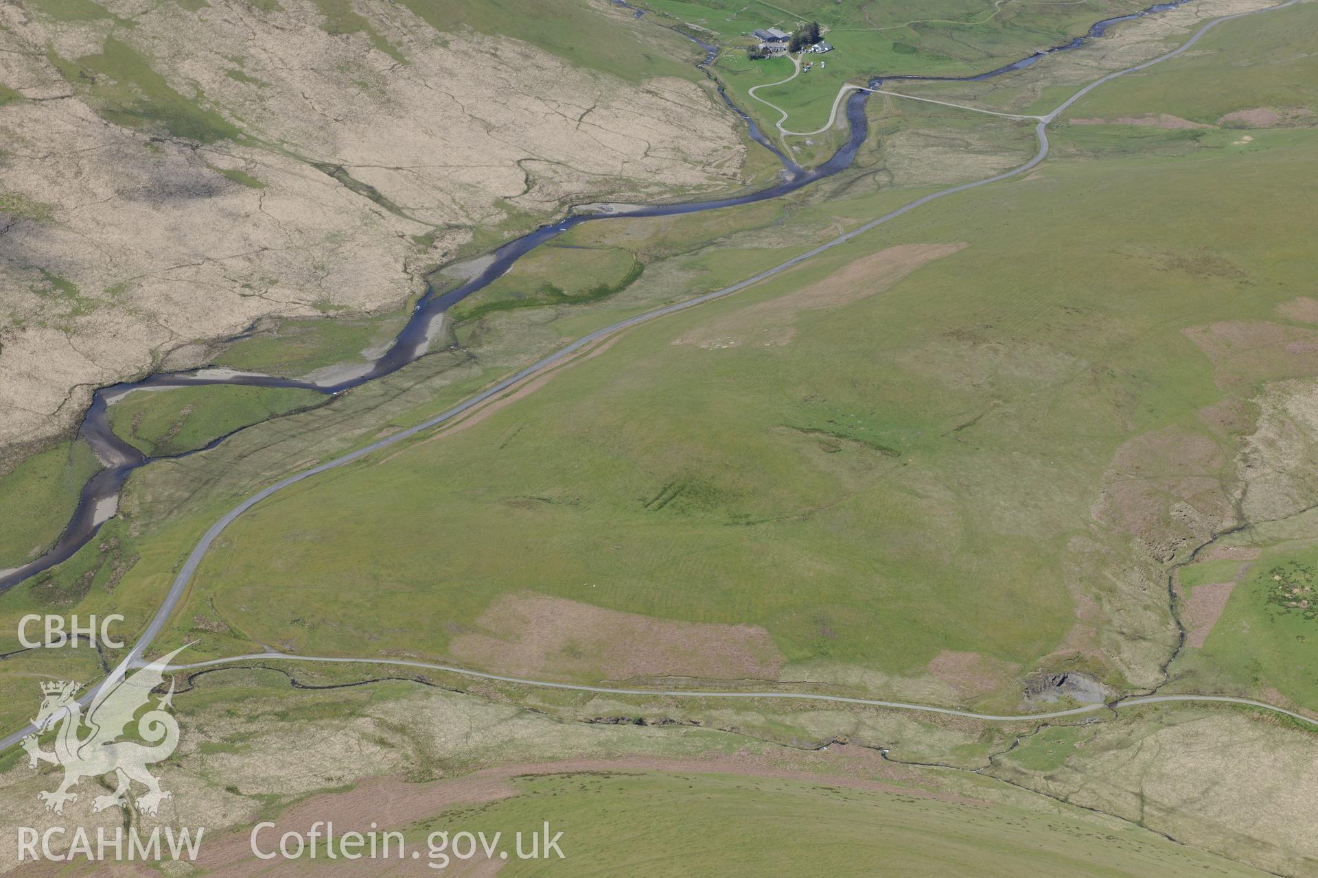 Aberglanhirin farm and bridge, Aberhenllan bridge and Esgair-y-Ty rabbit warren. Oblique aerial photograph taken during the Royal Commission's programme of archaeological aerial reconnaissance by Toby Driver on 3rd June 2015.