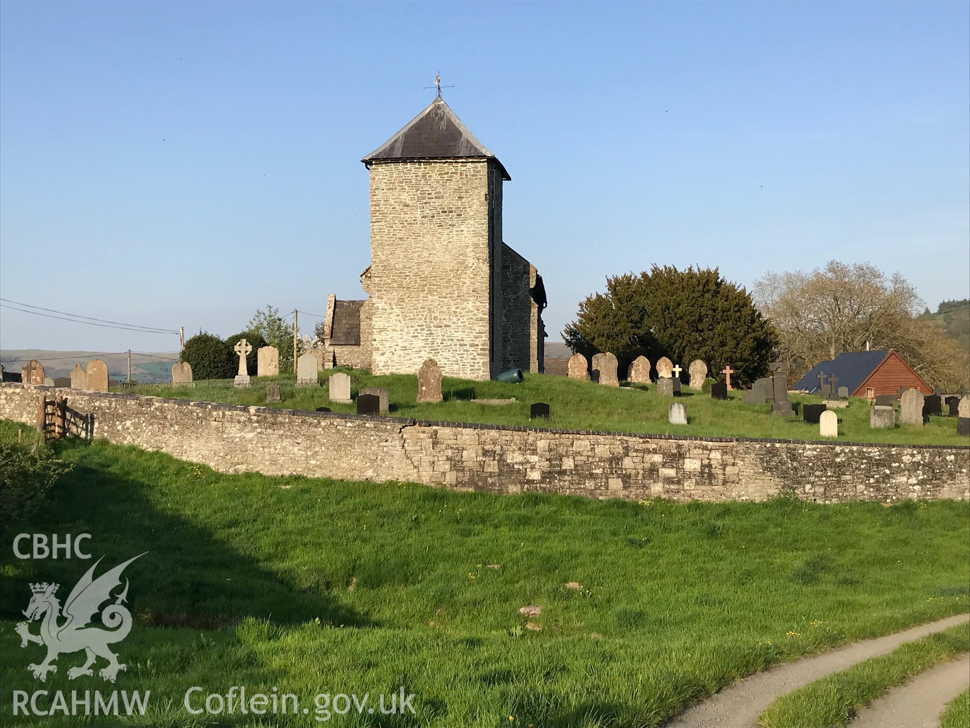 Colour photo showing exterior view of the St. David's church and associated graveyard, Llanddewi'r Cwm, taken by Paul R. Davis, 7th May 2018.