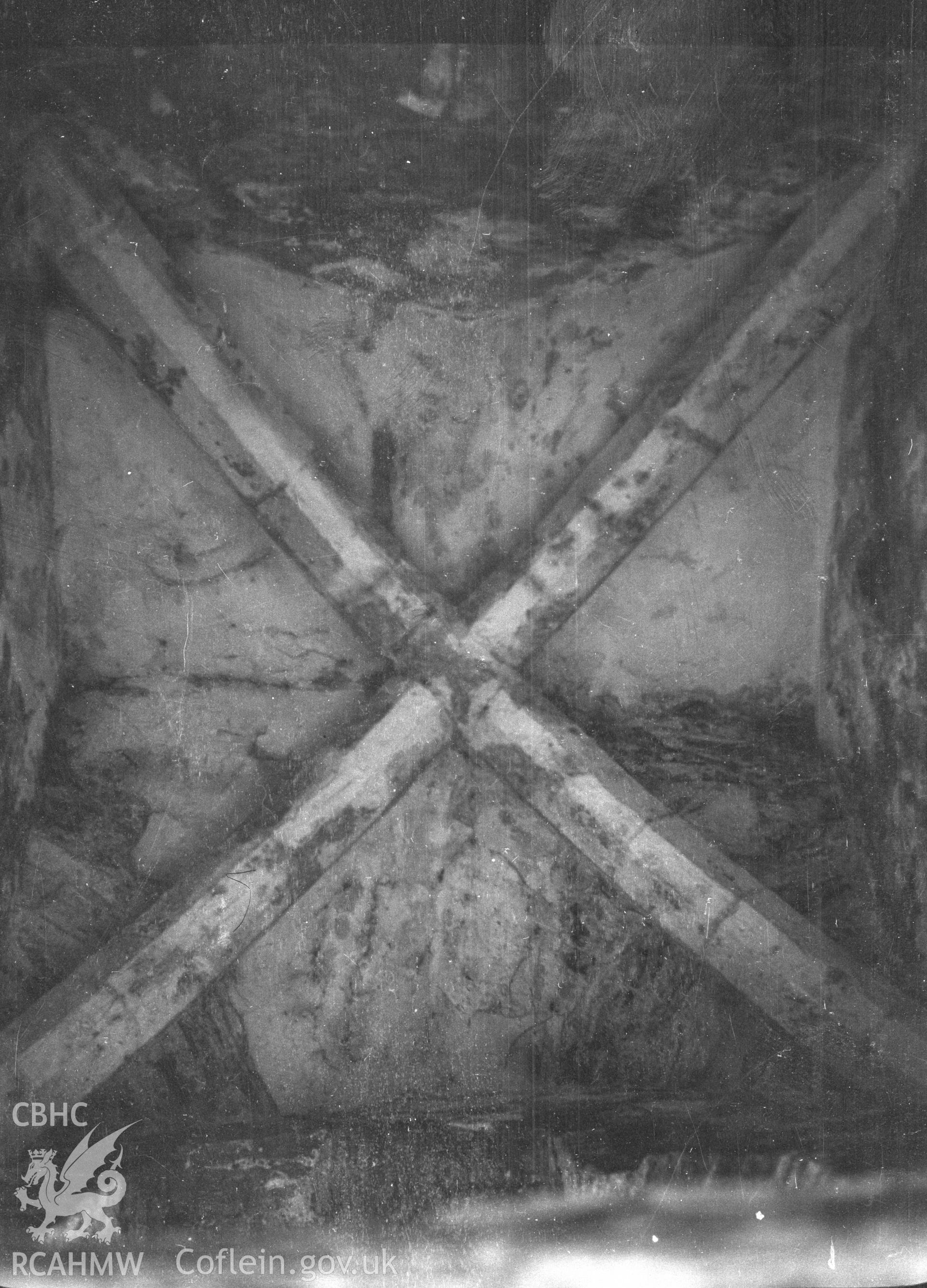 Digital copy of a nitrate negative showing view of vault from below of locus adjoining chapel, south side, Kidwelly Castle. From the National Building Record Postcard Collection.