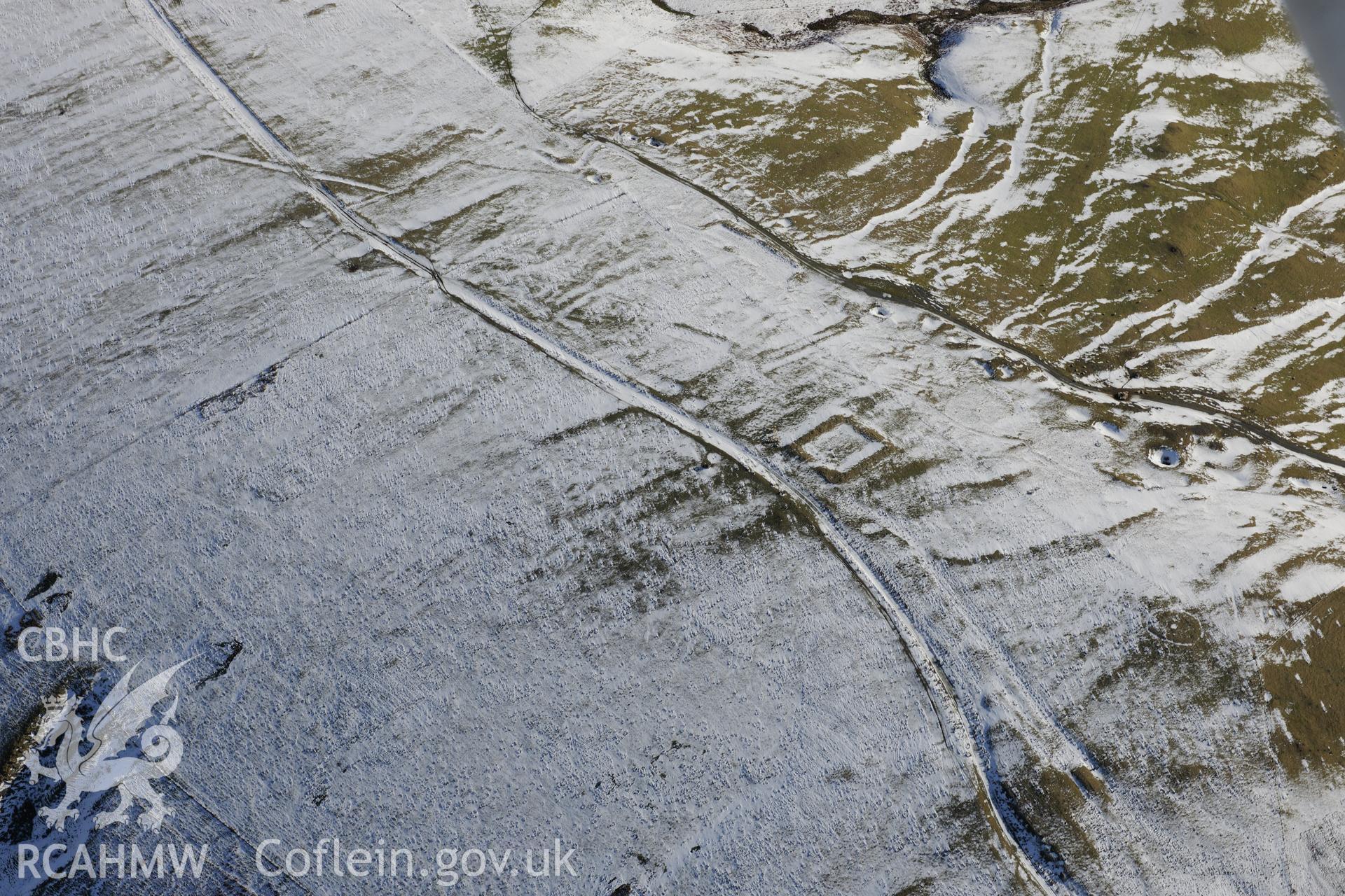 Pen y Crocbren Roman military settlement and gibbet mound, south west of Dylife, Machynlleth. Oblique aerial photograph taken during the Royal Commission's programme of archaeological aerial reconnaissance by Toby Driver on 4th February 2015.