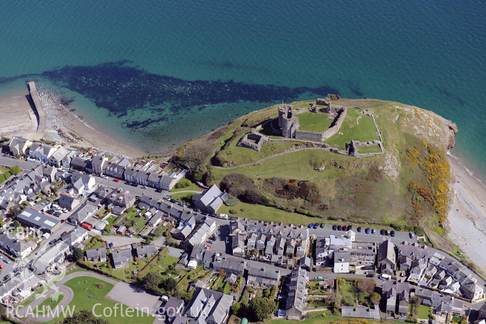 Criccieth town and castle. Oblique aerial photograph taken during the Royal Commission?s programme of archaeological aerial reconnaissance by Toby Driver on 1st May 2013.