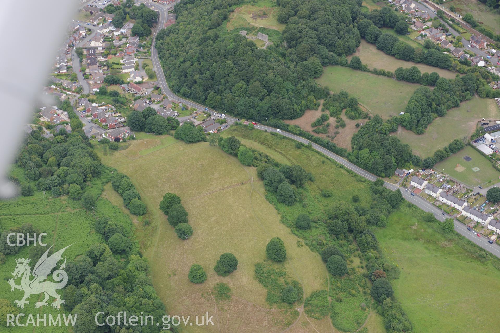 Caergwrle and Caergwrle Castle. Oblique aerial photograph taken during the Royal Commission's programme of archaeological aerial reconnaissance by Toby Driver on 30th July 2015.