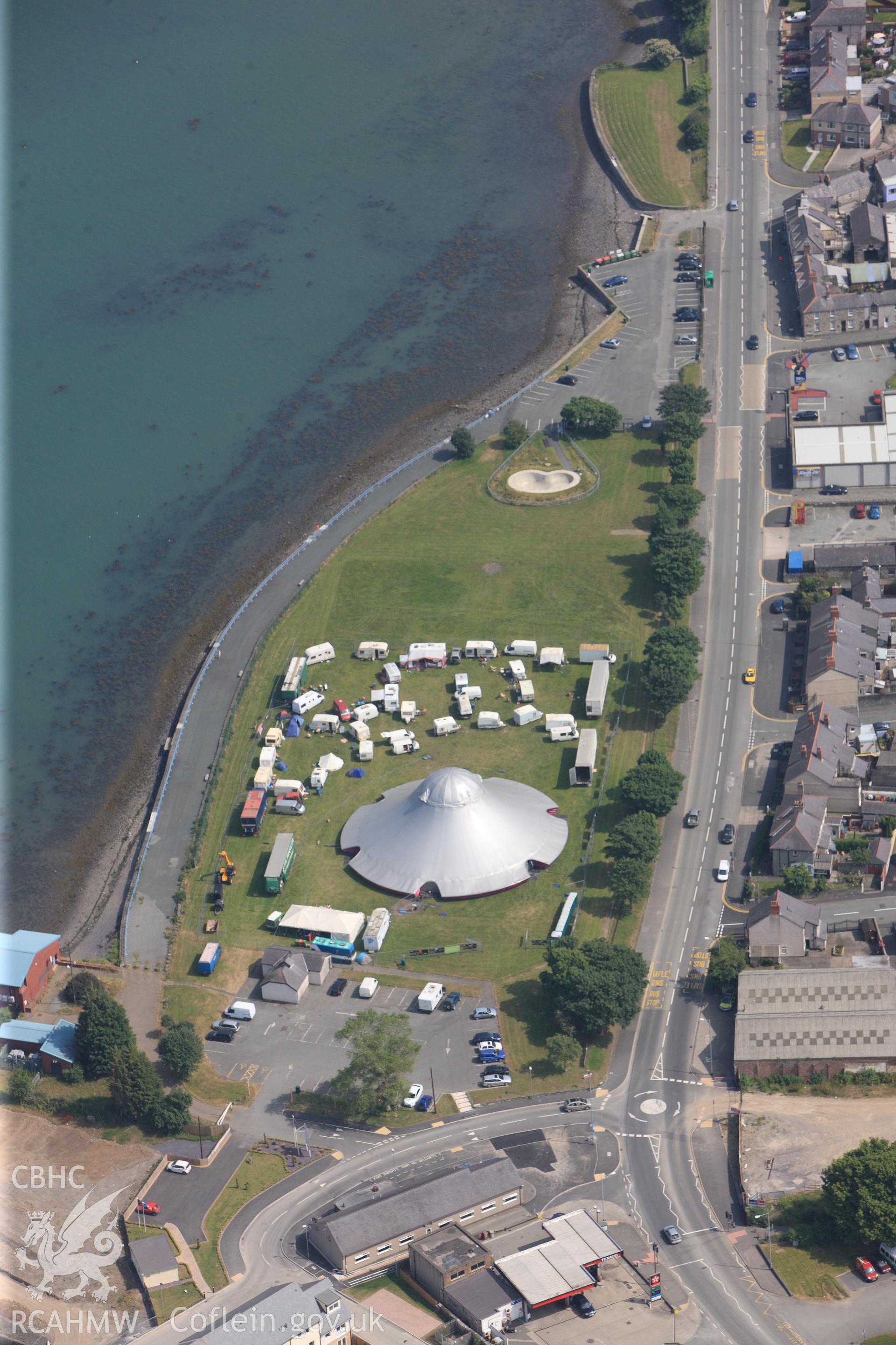 Funfair near Bangor harbour. Oblique aerial photograph taken during the Royal Commission?s programme of archaeological aerial reconnaissance by Toby Driver on 12th July 2013.