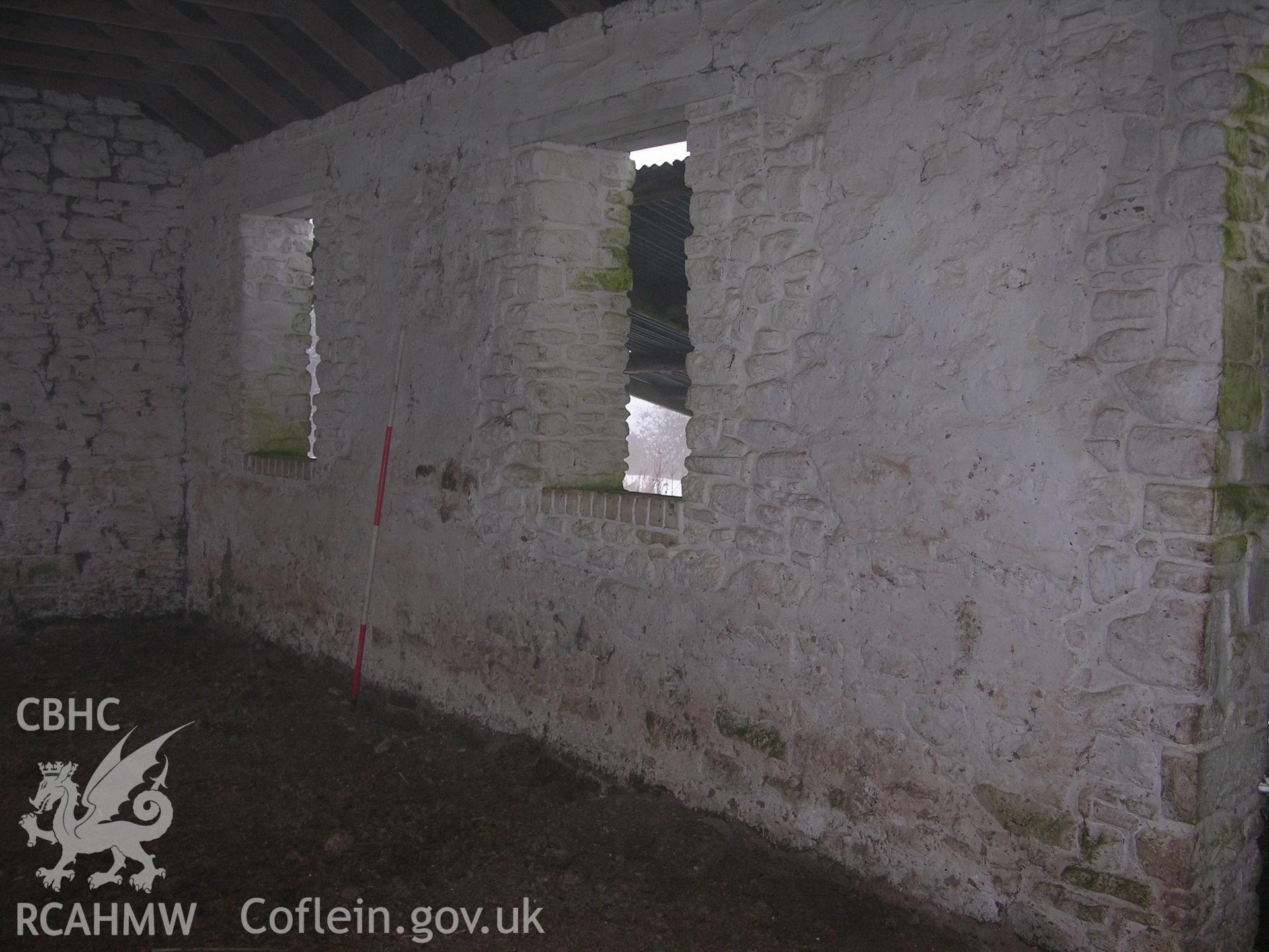 Digital photograph of an interior barn wall, from an Archaeological Building Recording of Hillside Barn, Llanvaches, Monmouthshire, which was conducted by Cambrian Archaeological Projects.