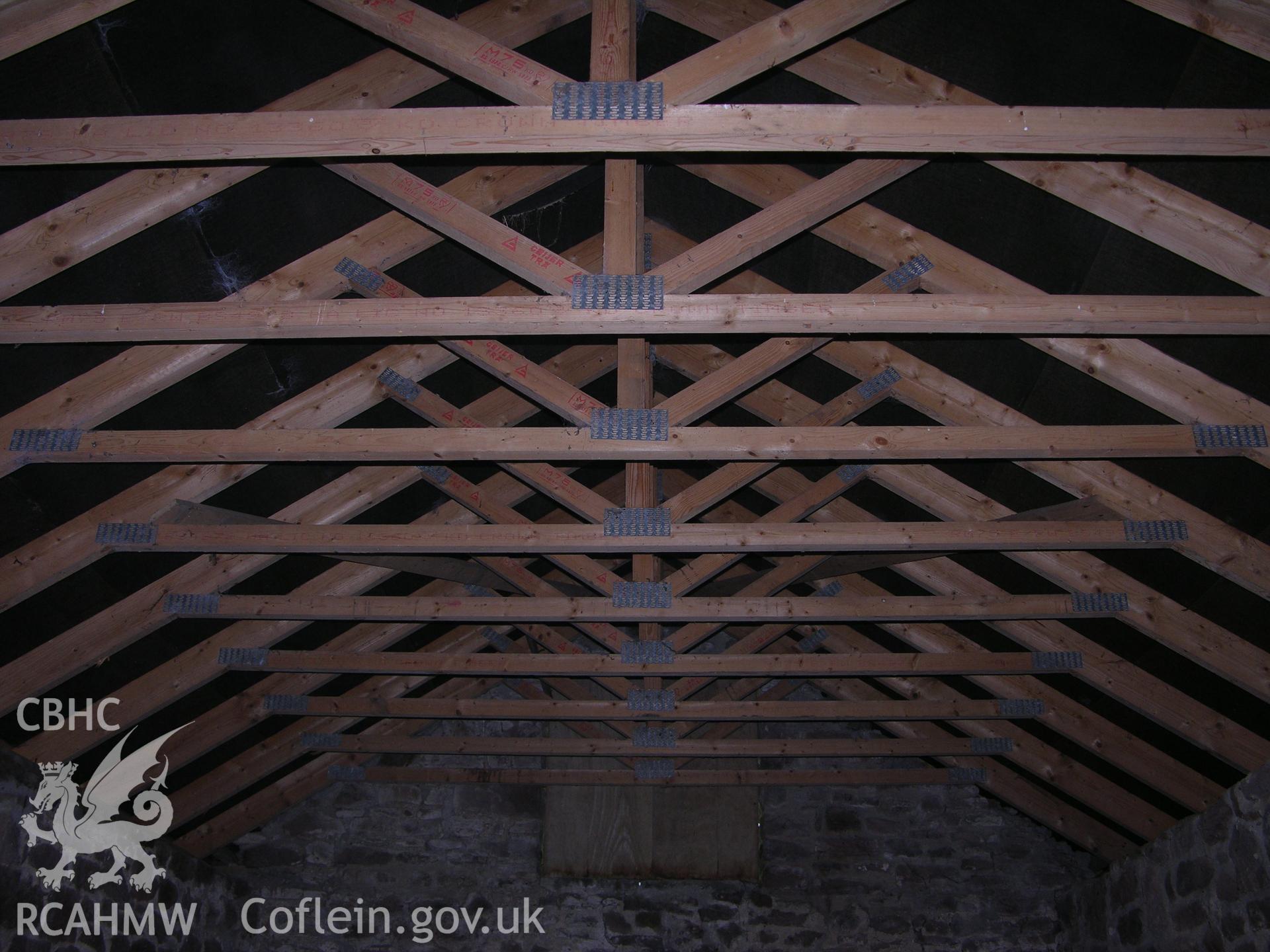 Digital photograph offering an interior view of the barns roof, from an Archaeological Building Recording of Hillside Barn, Llanvaches, Monmouthshire, which was conducted by Cambrian Archaeological Projects.