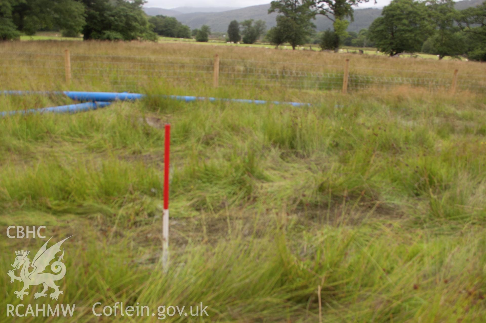 Digital photograph showing view from east of launch pit 2's general location. Photographed during Gwynedd Archaeological Trust's archaeological watching brief of water main renewal in Dolgellau on 28th July 2017. Project no. G2528.