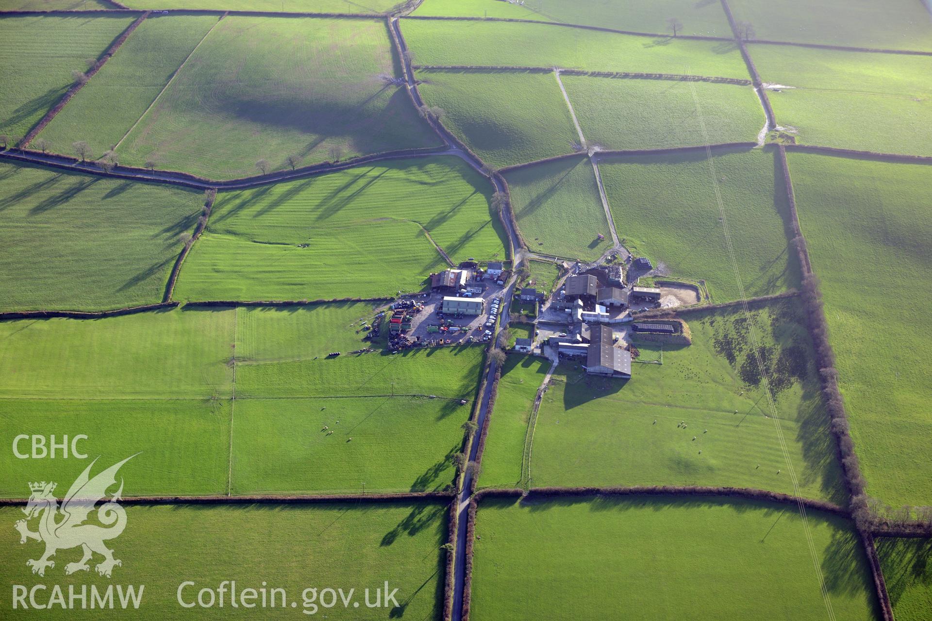 Lanfro Farm, Brynhelyg Mound and deserted rural settlement. Oblique aerial photograph taken during the Royal Commission's programme of archaeological aerial reconnaissance by Toby Driver on 6th January 2018.