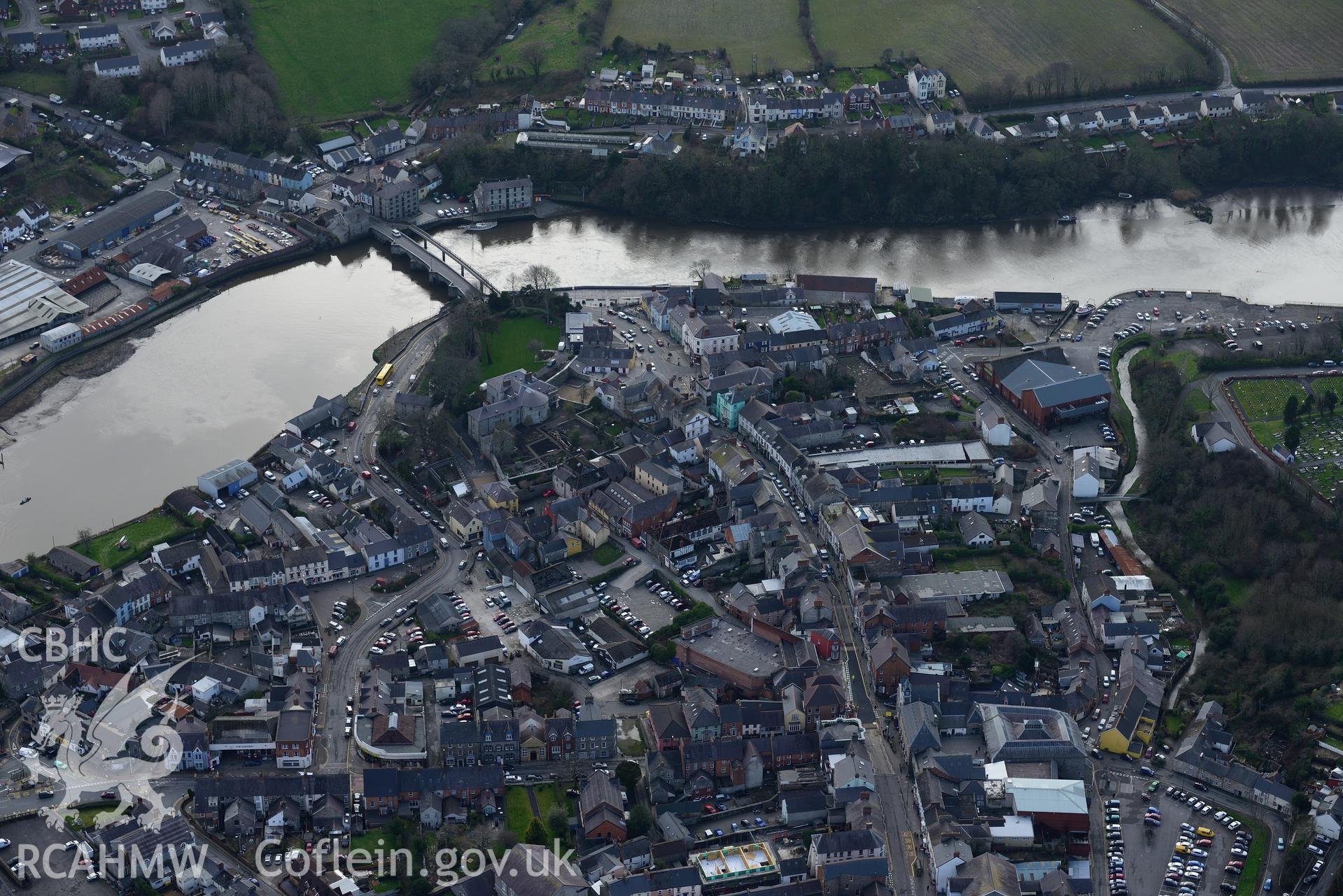 Cardigan Castle and the castle house; Cardigan Bridge and the market hall, Cardigan. Oblique aerial photograph taken during the Royal Commission's programme of archaeological aerial reconnaissance by Toby Driver on 13th March 2015.