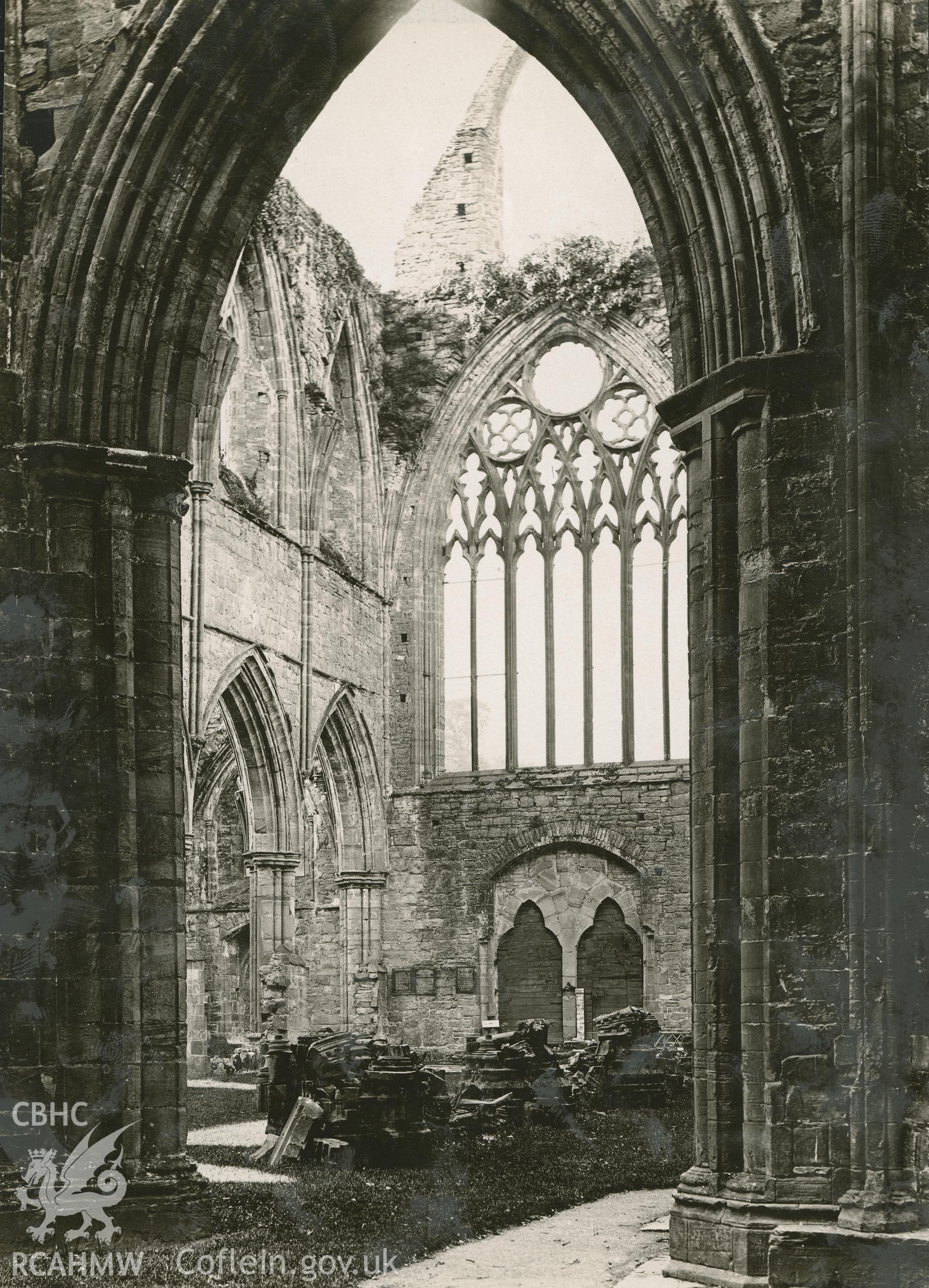 Digital copy of an early National Buildings Record photograph showing the west end of the nave at Tintern Abbey.