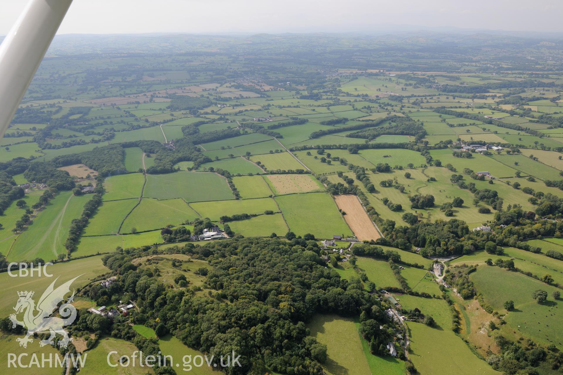 Craig Tremeirchion, including site of Cae-Gwyn cave and Ffynnon Beuno cave. Oblique aerial photograph taken during the Royal Commission's programme of archaeological aerial reconnaissance by Toby Driver on 11th September 2015.