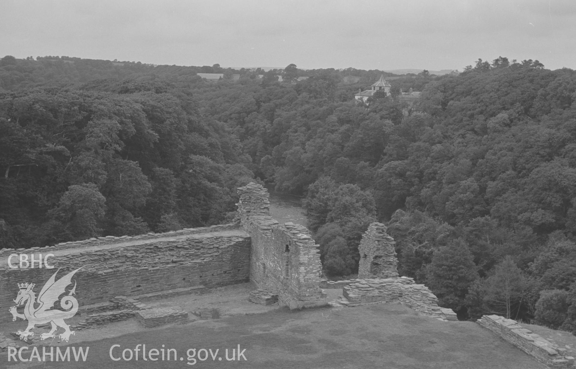 Digital copy of a black and white negative showing view of Coedmor House from Cilgerran castle. Photographed in September 1963 by Arthur O. Chater from Grid Reference SN 1952 4313, looking north.