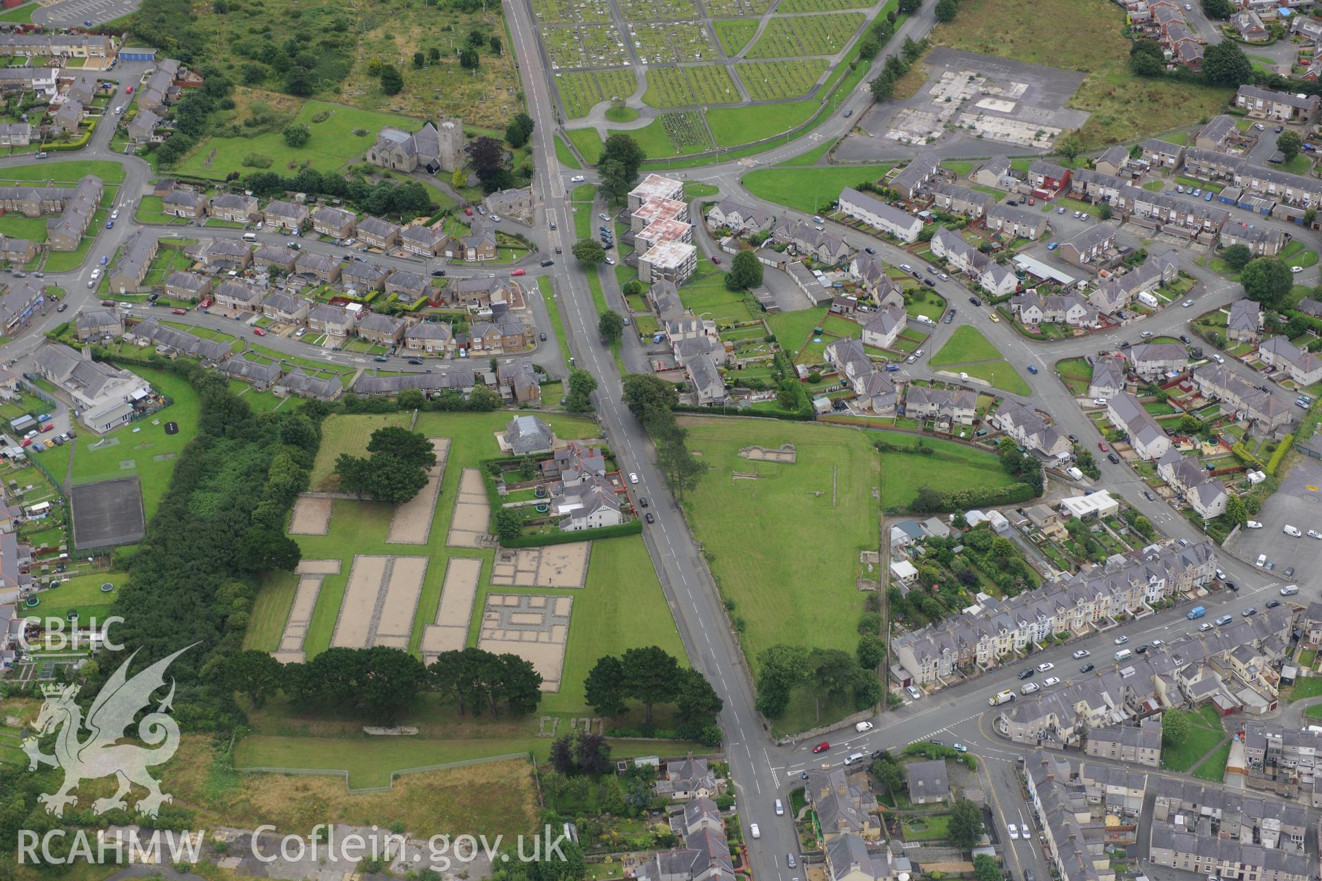 Site of Roman burial ground; section of Roman road from Caerhun to Caernarfon and Segontium Roman military settlement, Caernarfon. Oblique aerial photograph taken during the Royal Commission's programme of archaeological aerial reconnaissance by Toby Driver on 30th July 2015.