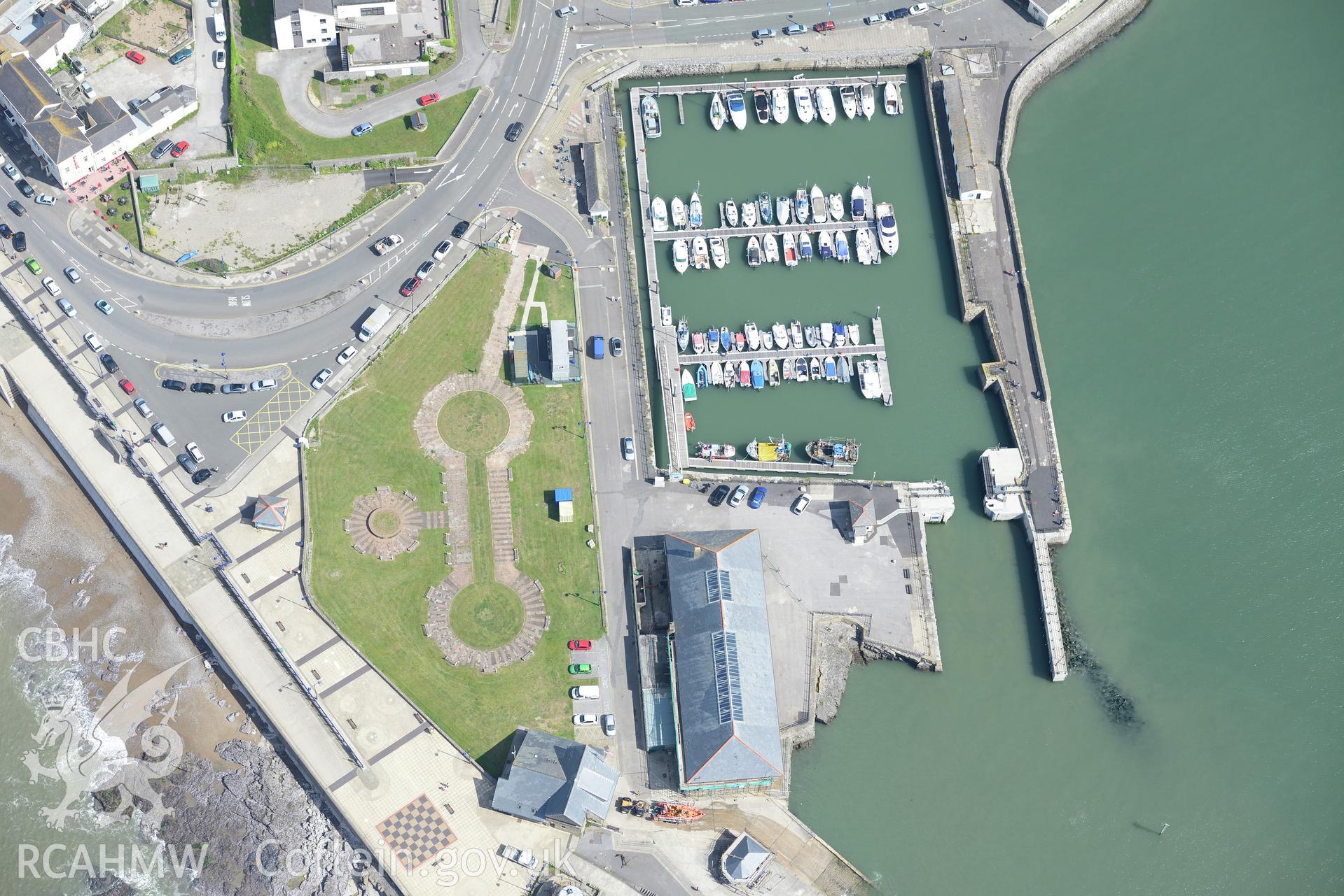 Views of Porthcawl Harbour and the town of Porthcawl. Oblique aerial photograph taken during the Royal Commission's programme of archaeological aerial reconnaissance by Toby Driver on 19th June 2015.