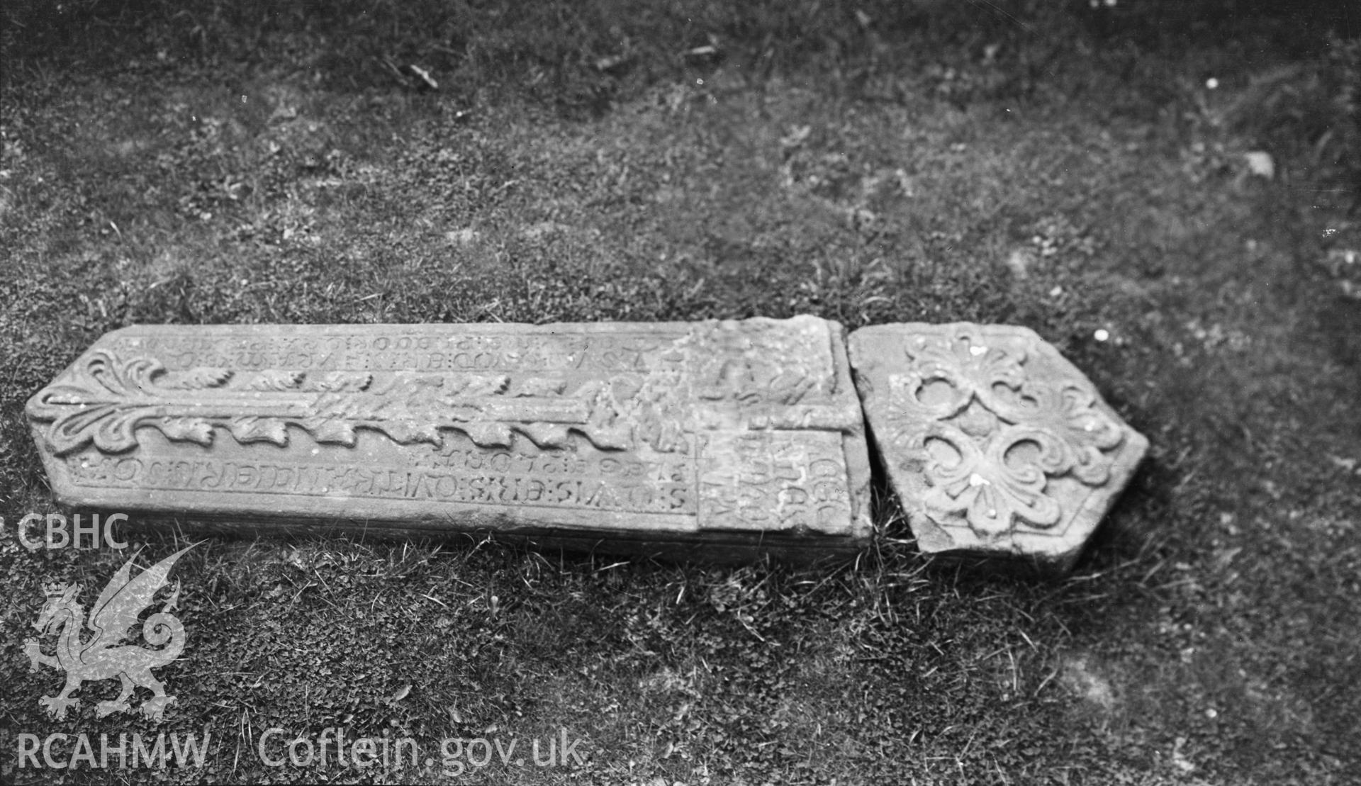 Digital copy of nitrate negative showing view of inscribed stone at Chirk Castle taken by Leonard Monroe, undated.