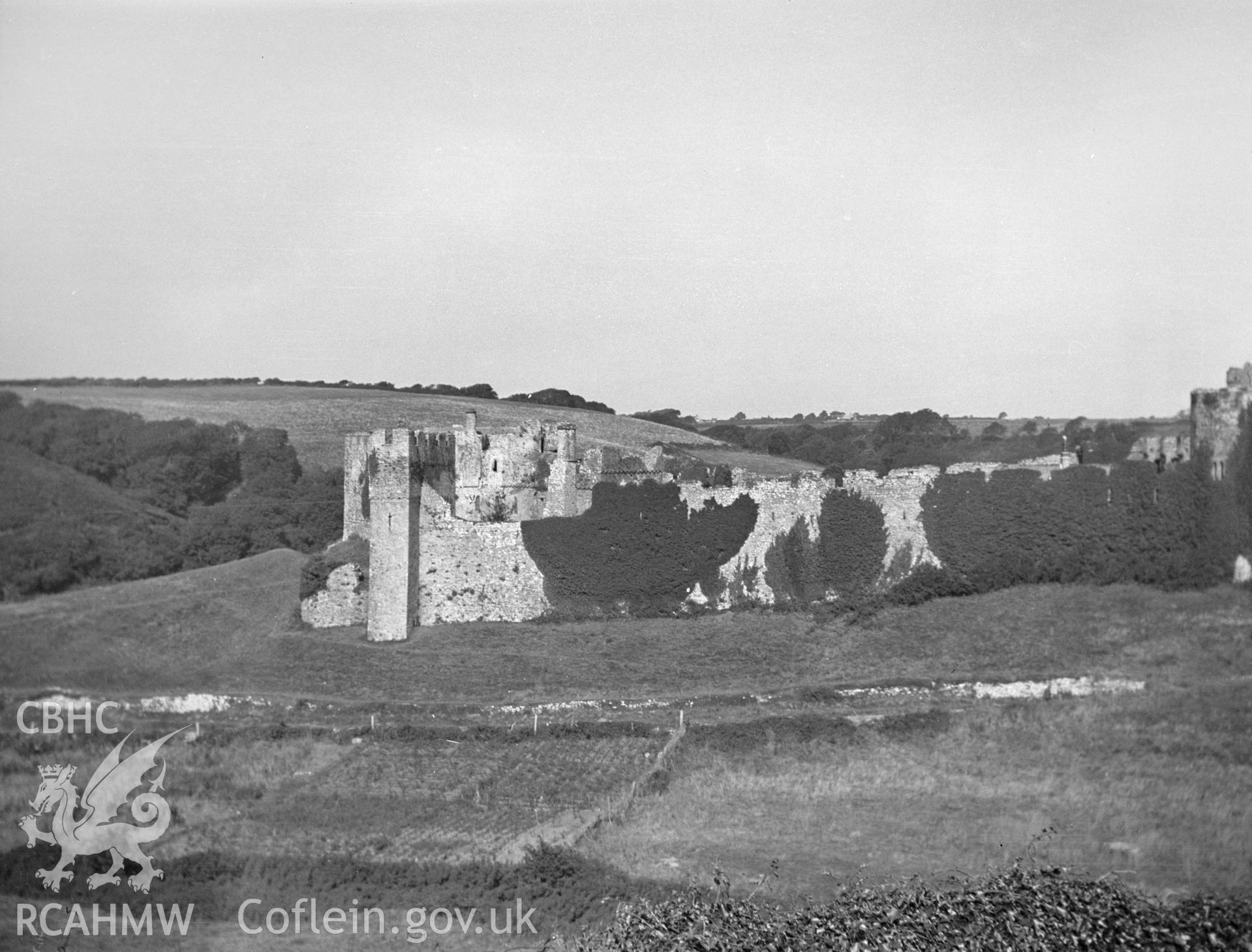 Digital copy of a nitrate negative showing landscape view of Manorbier Castle. From the National Building Record Postcard Collection.