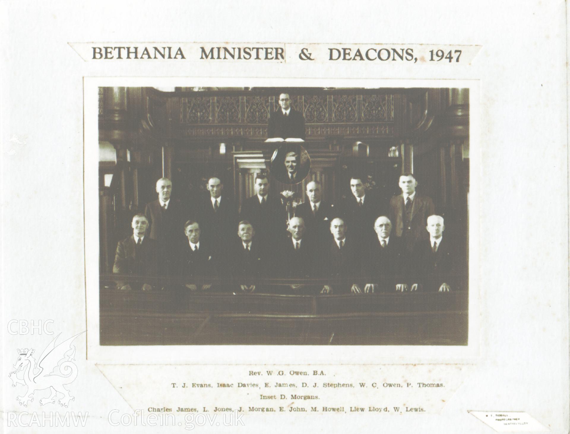 Black and white photograph of the Minister and Deacons at Bethania Chapel, Maesteg, 1947, with names listed below. Donated to the RCAHMW by Cyril Philips as part of the Digital Dissent Project.