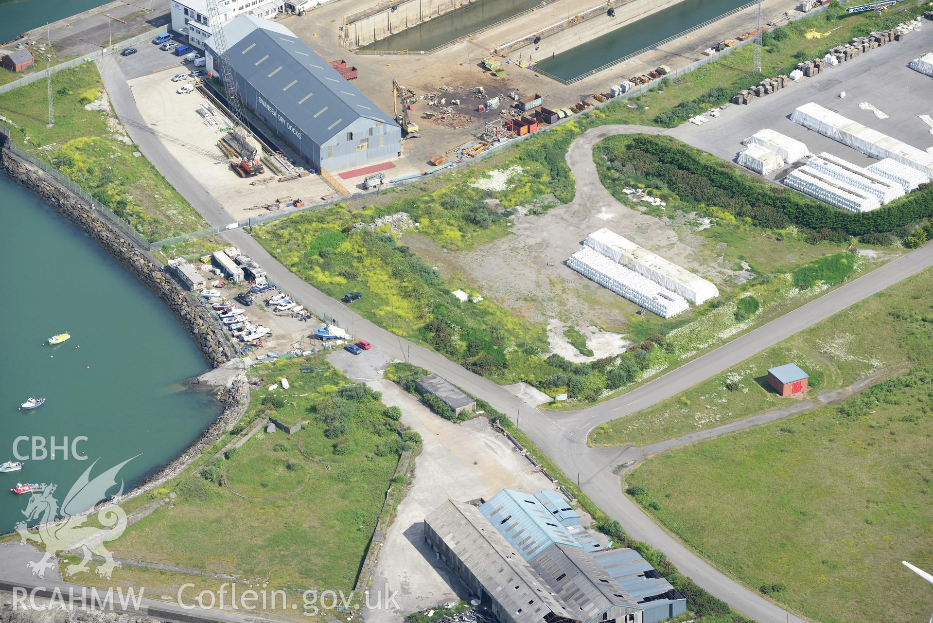 Repair workshop at the Prince of Wales dry dock, Swansea. Oblique aerial photograph taken during the Royal Commission's programme of archaeological aerial reconnaissance by Toby Driver on 19th June 2015.