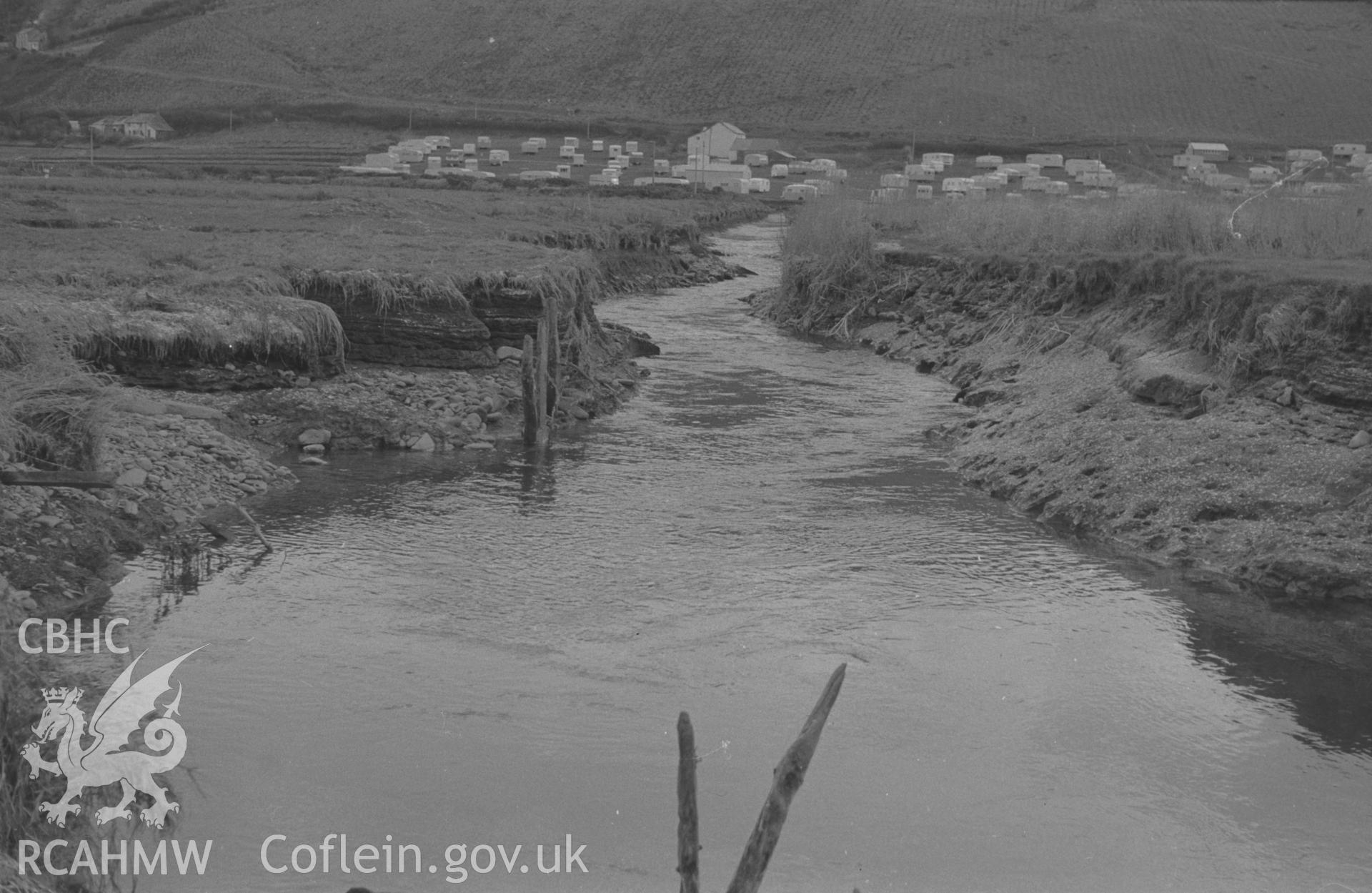 Digital copy of black & white negative showing view up the Clarach from just above the footbridge; Glan-y-Mor-Fach in centre; Ty-Gwyn on left. Photographed by Arthur O. Chater on 25th December 1964 from Grid Ref SN 5873 8401, looking south south east.