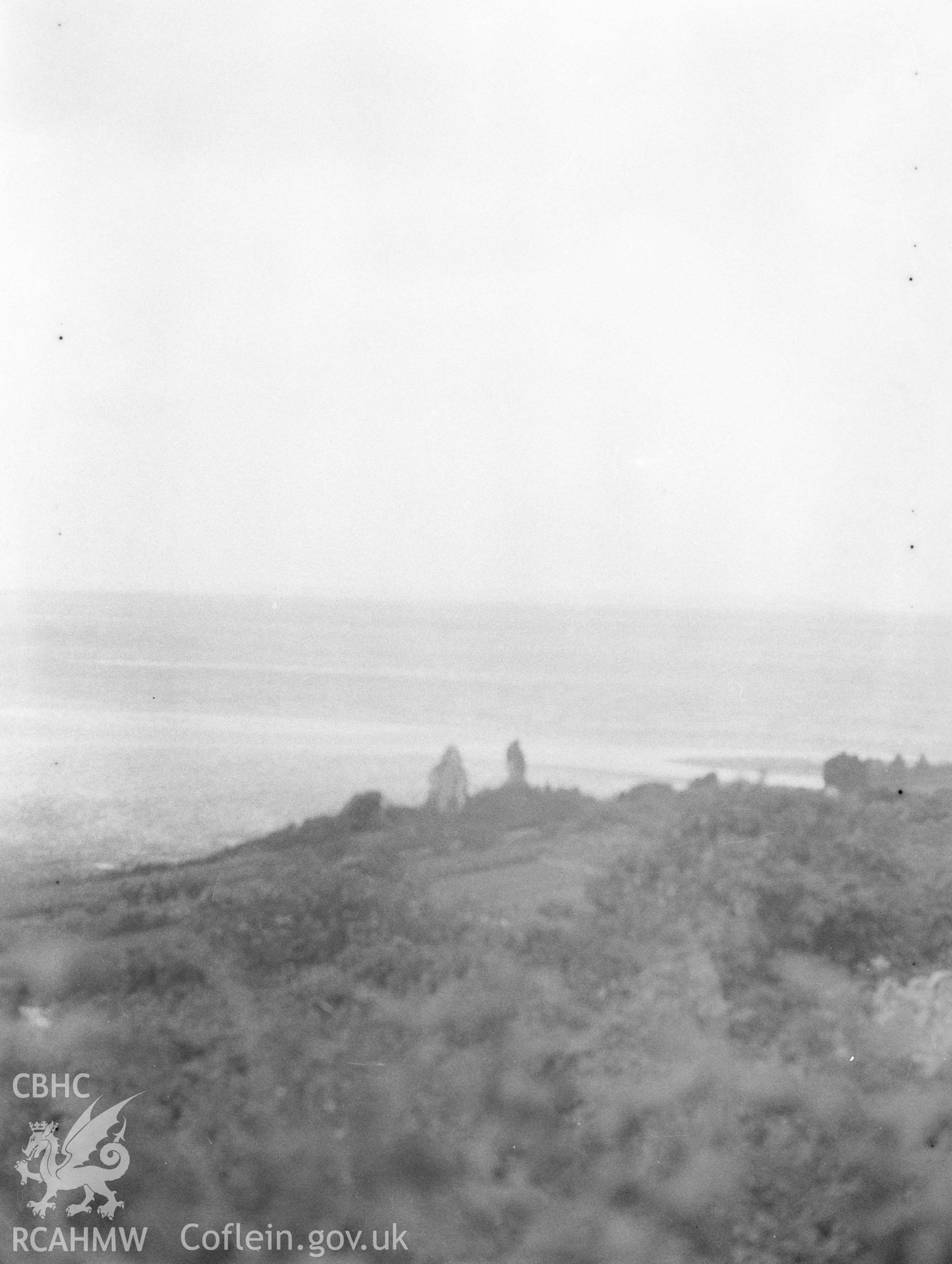 Digital copy of a nitrate negative showing exterior view of distant view of Gogarth Abbey Remains. From the National Building Record Postcard Collection.