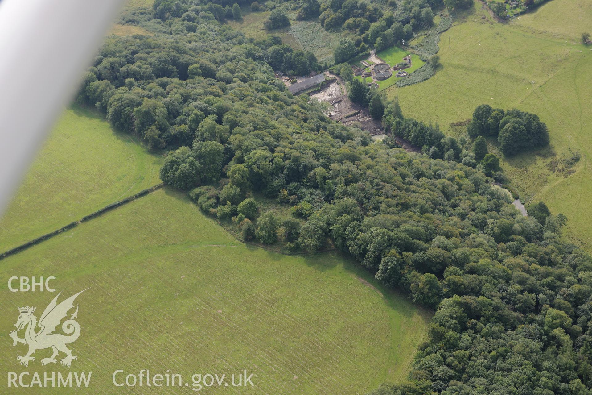 Enclosure at Coed Trefraith, near Holywell. Oblique aerial photograph taken during the Royal Commission's programme of archaeological aerial reconnaissance by Toby Driver on 11th September 2015.