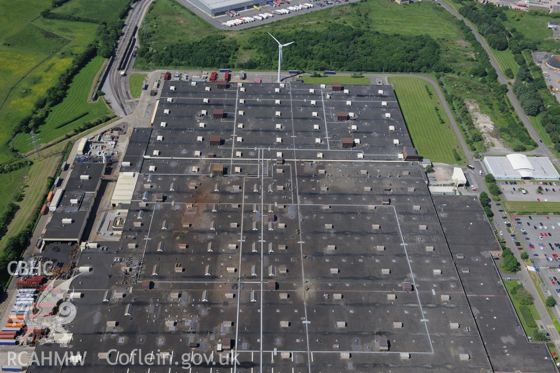 Waterton industrial estate, Bridgend. Oblique aerial photograph taken during the Royal Commission's programme of archaeological aerial reconnaissance by Toby Driver on 19th June 2015.