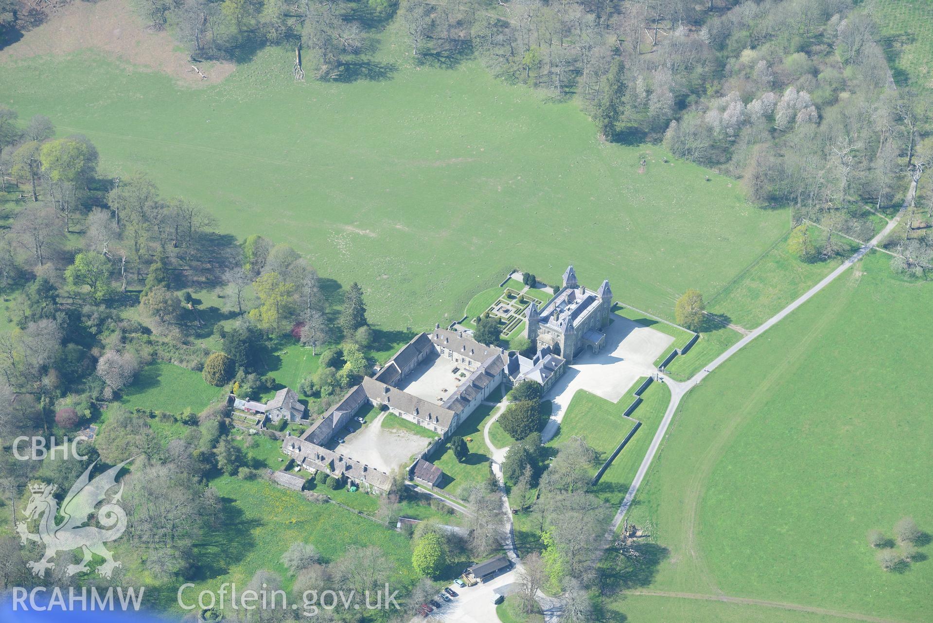 Dinefwr Castle's Newton House, Inner Courtyard, fountain, park, grounds and garden and WW2 Military Camp . Oblique aerial photograph taken during the Royal Commission's programme of archaeological aerial reconnaissance by Toby Driver on 21st April 2015