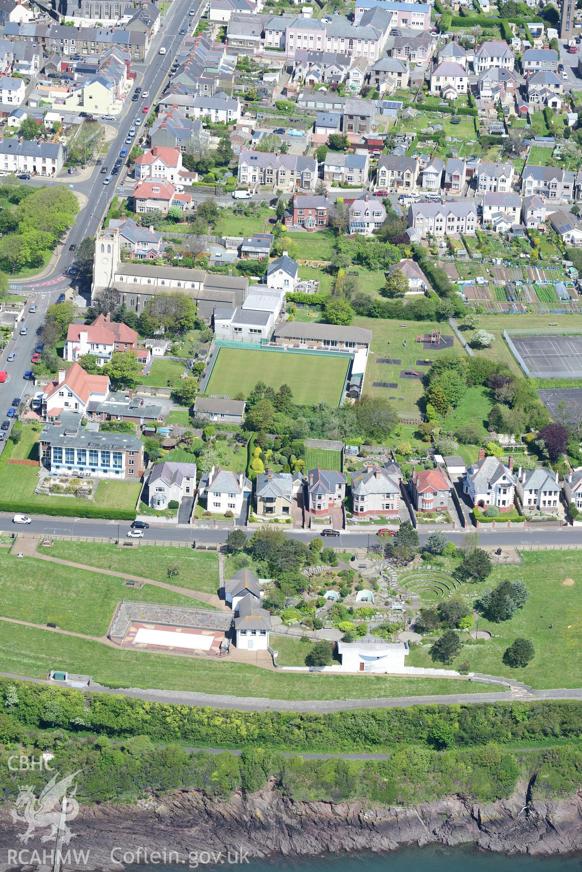 St. Katherine's Church and Pill Public Garden, Milford Haven, Pembrokeshire. Oblique aerial photograph taken during the Royal Commission's programme of archaeological aerial reconnaissance by Toby Driver on 13th May 2015.